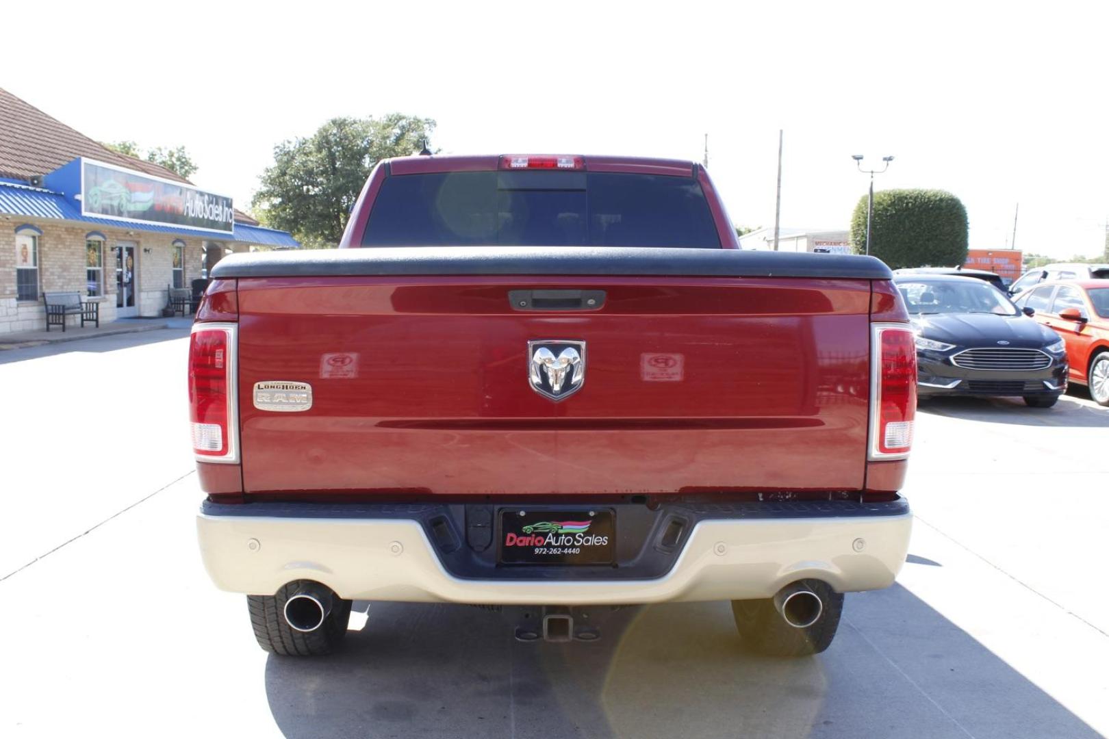 2014 RED RAM 1500 Laramie Longhorn Edi (1C6RR6PM3ES) with an 3.0L V6 DIESEL engine, 8-Speed Automatic transmission, located at 2401 E Main St., Grand Prairie, TX, 75050, (972) 262-4440, 32.748981, -96.969643 - Photo#3