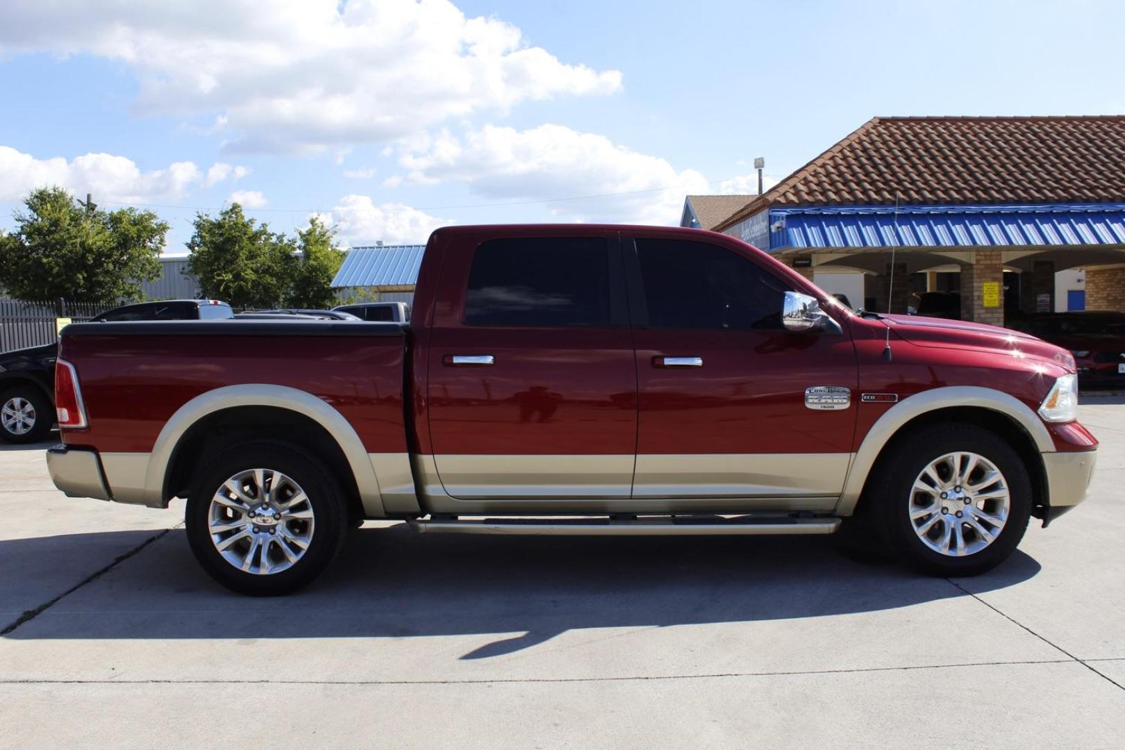 2014 RED RAM 1500 Laramie Longhorn Edi (1C6RR6PM3ES) with an 3.0L V6 DIESEL engine, 8-Speed Automatic transmission, located at 2401 E Main St., Grand Prairie, TX, 75050, (972) 262-4440, 32.748981, -96.969643 - Photo#5