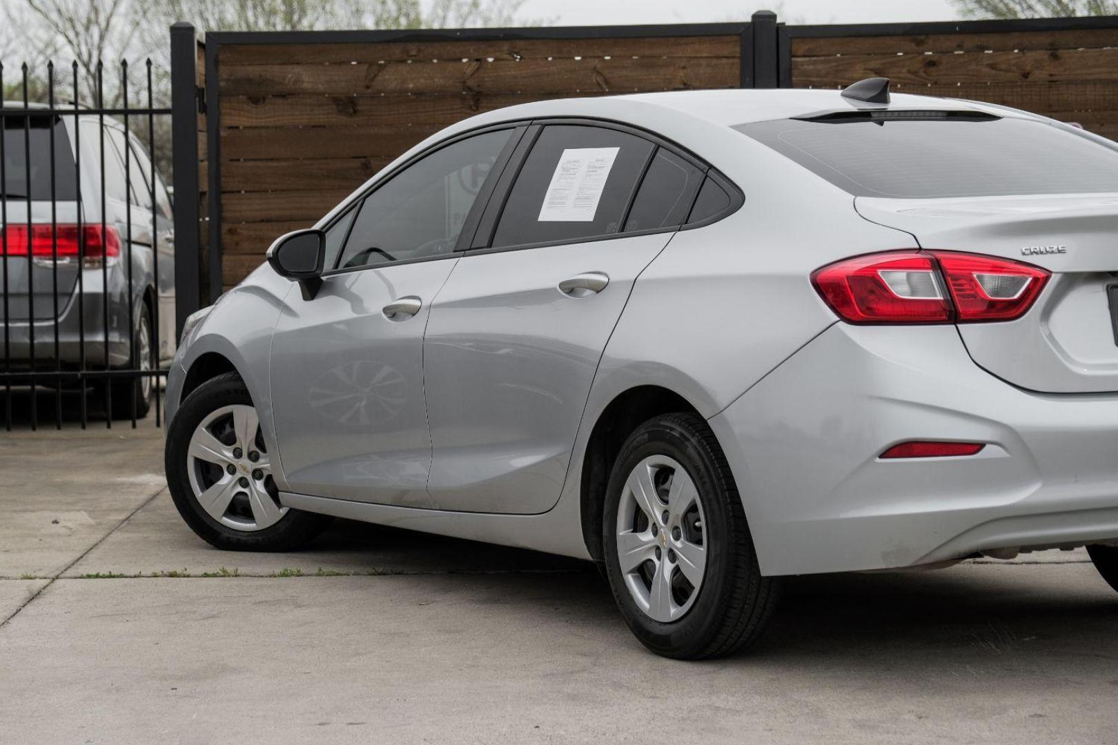 2018 SILVER Chevrolet Cruze LS Auto (1G1BC5SM2J7) with an 1.4L L4 DOHC 16V TUR engine, 6-Speed Automatic transmission, located at 2401 E Main St., Grand Prairie, TX, 75050, (972) 262-4440, 32.748981, -96.969643 - Photo#12