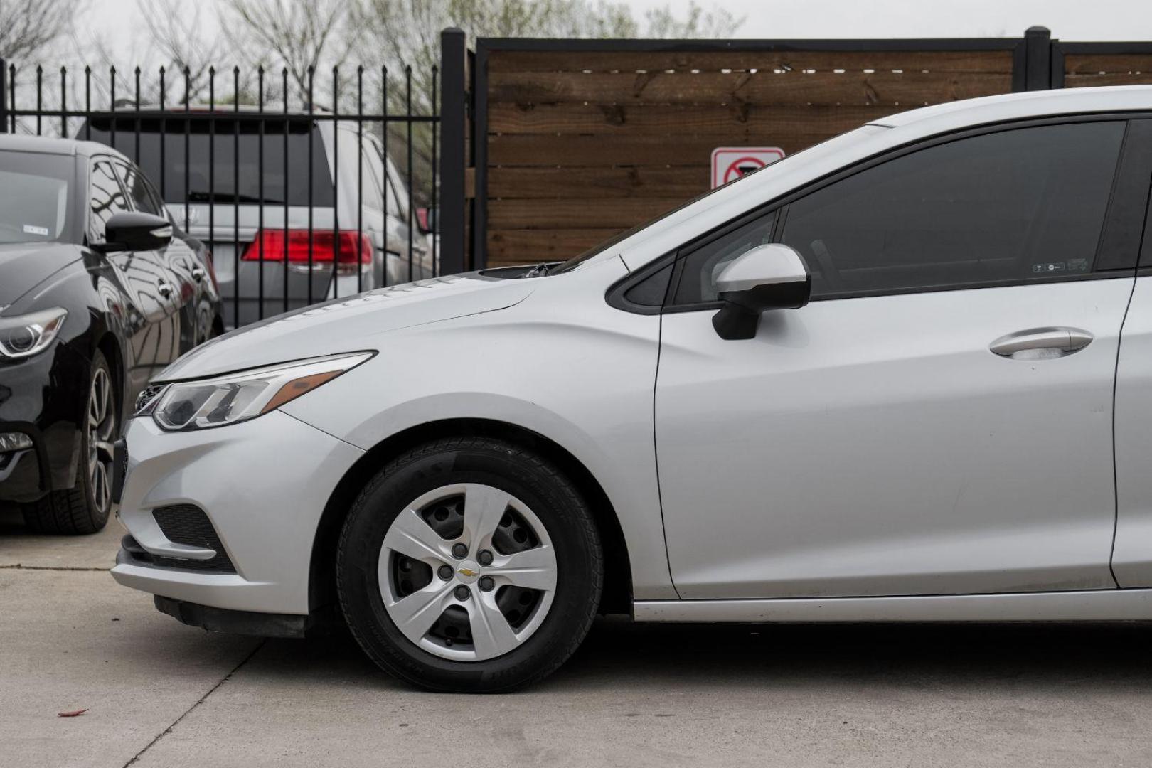 2018 SILVER Chevrolet Cruze LS Auto (1G1BC5SM2J7) with an 1.4L L4 DOHC 16V TUR engine, 6-Speed Automatic transmission, located at 2401 E Main St., Grand Prairie, TX, 75050, (972) 262-4440, 32.748981, -96.969643 - Photo#15