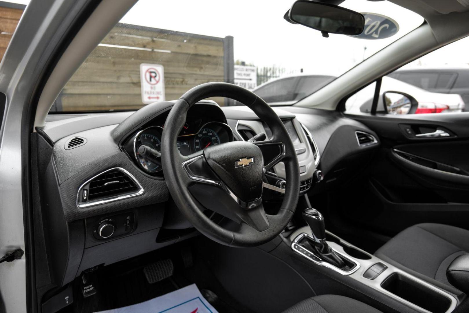 2018 SILVER Chevrolet Cruze LS Auto (1G1BC5SM2J7) with an 1.4L L4 DOHC 16V TUR engine, 6-Speed Automatic transmission, located at 2401 E Main St., Grand Prairie, TX, 75050, (972) 262-4440, 32.748981, -96.969643 - Photo#2