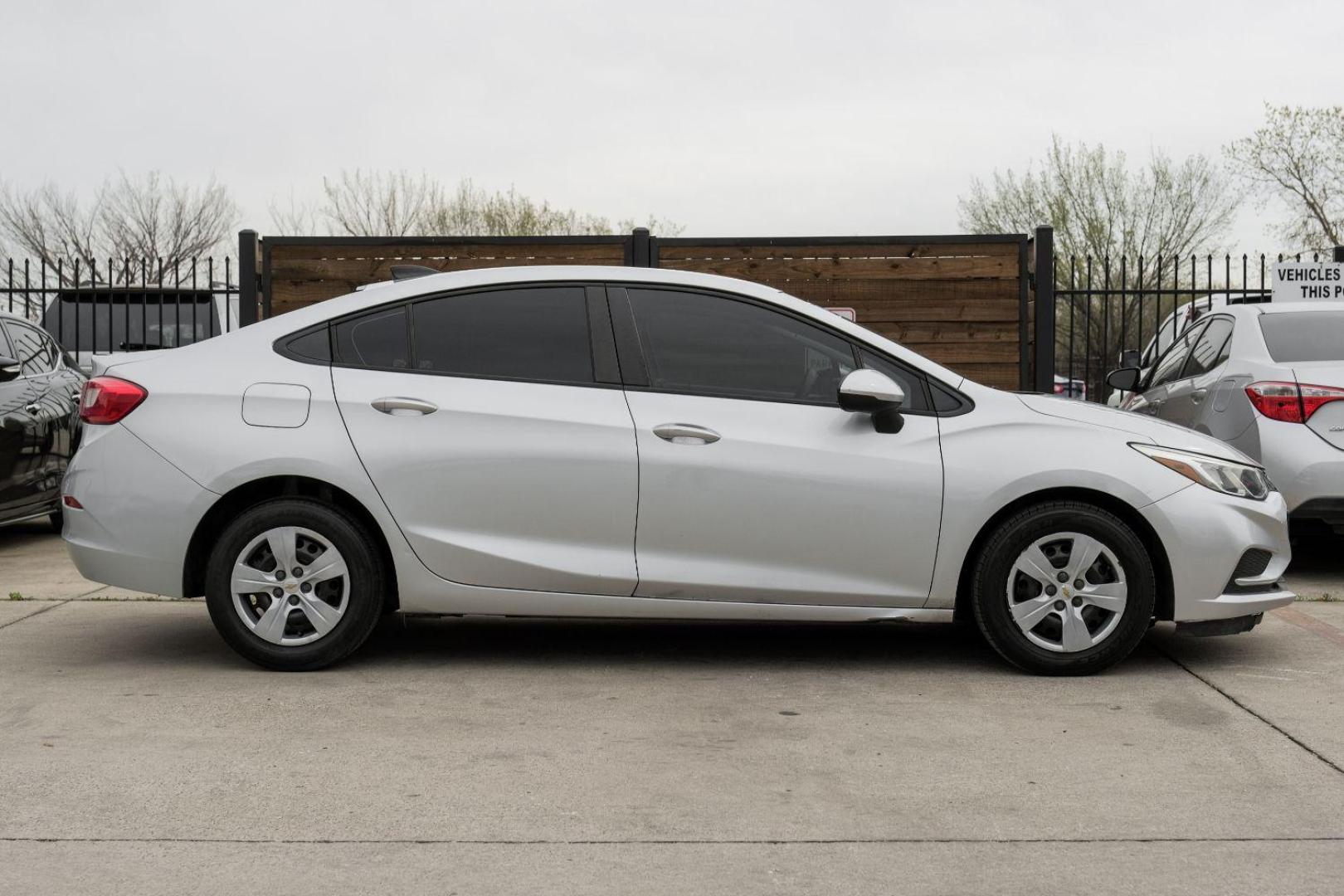 2018 SILVER Chevrolet Cruze LS Auto (1G1BC5SM2J7) with an 1.4L L4 DOHC 16V TUR engine, 6-Speed Automatic transmission, located at 2401 E Main St., Grand Prairie, TX, 75050, (972) 262-4440, 32.748981, -96.969643 - Photo#8