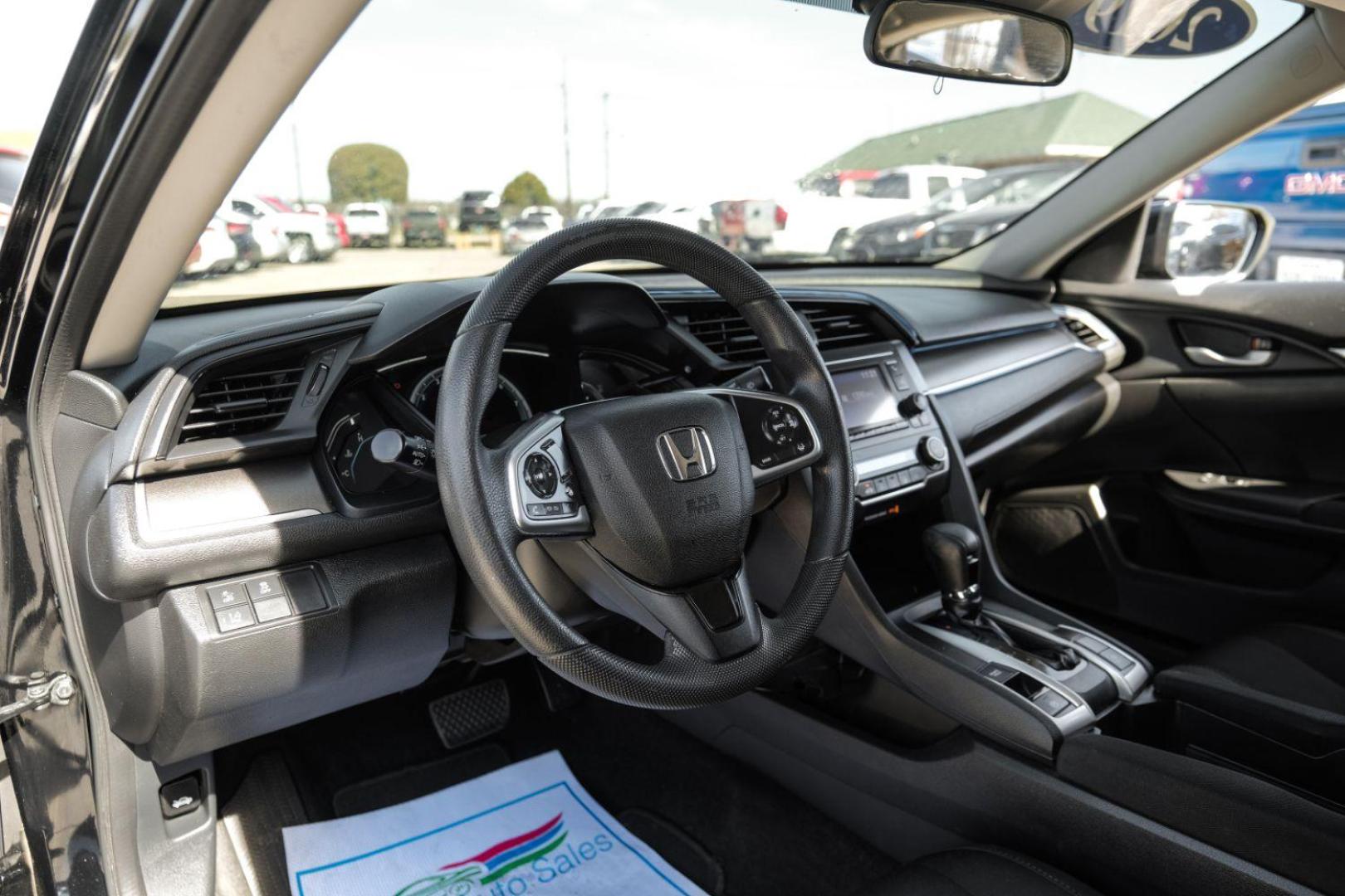 2019 Black Honda Civic LX Honda Sensing Sed (2HGFC2F62KH) with an 2.0L L4 DOHC 16V engine, Continuously Variabl transmission, located at 2401 E Main St., Grand Prairie, TX, 75050, (972) 262-4440, 32.748981, -96.969643 - Photo#2