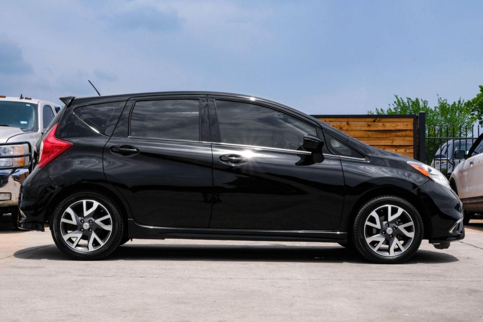 2015 black Nissan Versa Note SR (3N1CE2CP3FL) with an 1.6L L4 DOHC 16V engine, Continuously Variable Transmission transmission, located at 2401 E Main St., Grand Prairie, TX, 75050, (972) 262-4440, 32.748981, -96.969643 - Photo#4