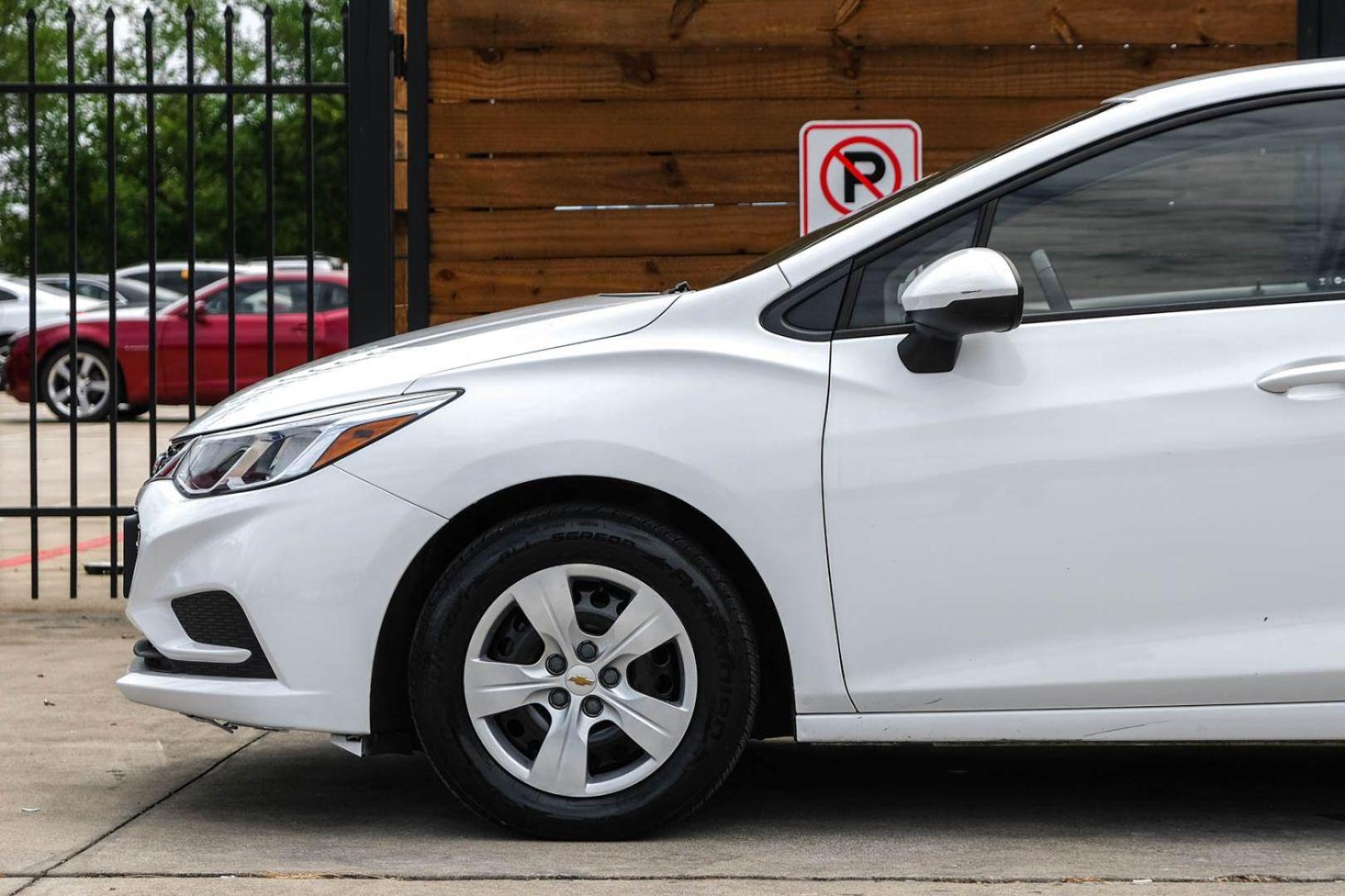 2018 WHITE Chevrolet Cruze LS Auto (1G1BC5SM0J7) with an 1.4L L4 DOHC 16V TURBO engine, 6-Speed Automatic transmission, located at 2401 E Main St., Grand Prairie, TX, 75050, (972) 262-4440, 32.748981, -96.969643 - Photo#9