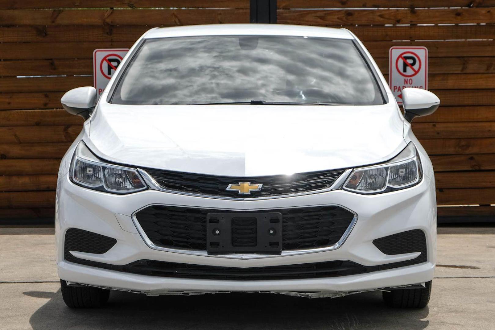 2018 WHITE Chevrolet Cruze LS Auto (1G1BC5SM0J7) with an 1.4L L4 DOHC 16V TURBO engine, 6-Speed Automatic transmission, located at 2401 E Main St., Grand Prairie, TX, 75050, (972) 262-4440, 32.748981, -96.969643 - Photo#2