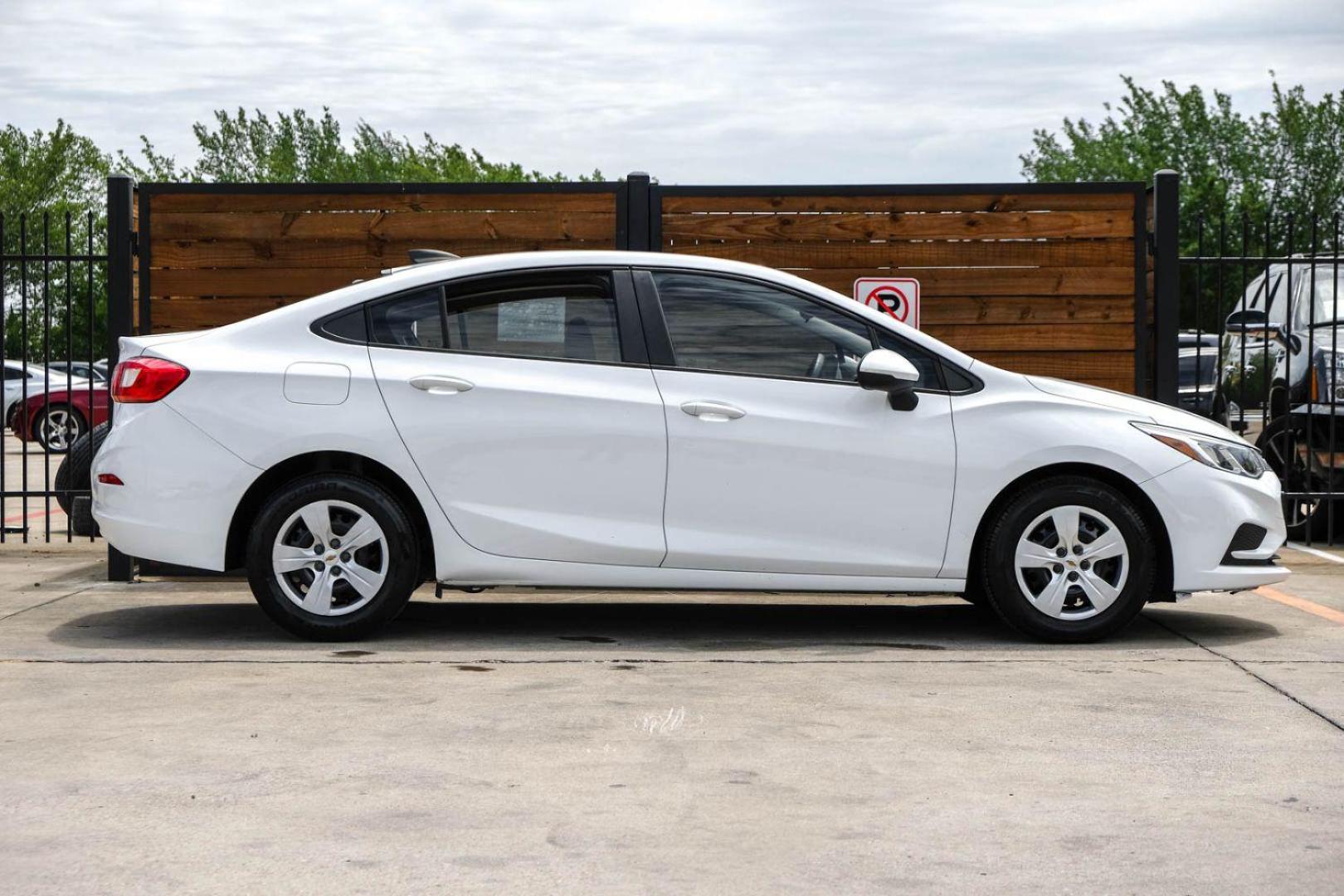 2018 WHITE Chevrolet Cruze LS Auto (1G1BC5SM0J7) with an 1.4L L4 DOHC 16V TURBO engine, 6-Speed Automatic transmission, located at 2401 E Main St., Grand Prairie, TX, 75050, (972) 262-4440, 32.748981, -96.969643 - Photo#4