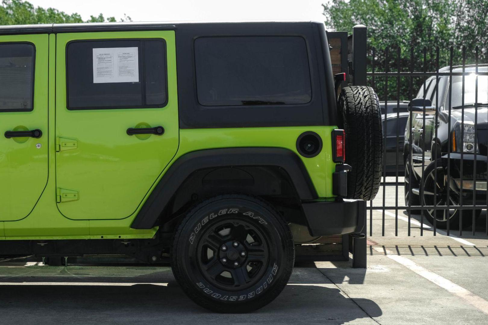 2017 green Jeep Wrangler Unlimited Sport 4WD (1C4BJWDG8HL) with an 3.6L V6 DOHC 24V FFV engine, located at 2401 E Main St., Grand Prairie, TX, 75050, (972) 262-4440, 32.748981, -96.969643 - Photo#9