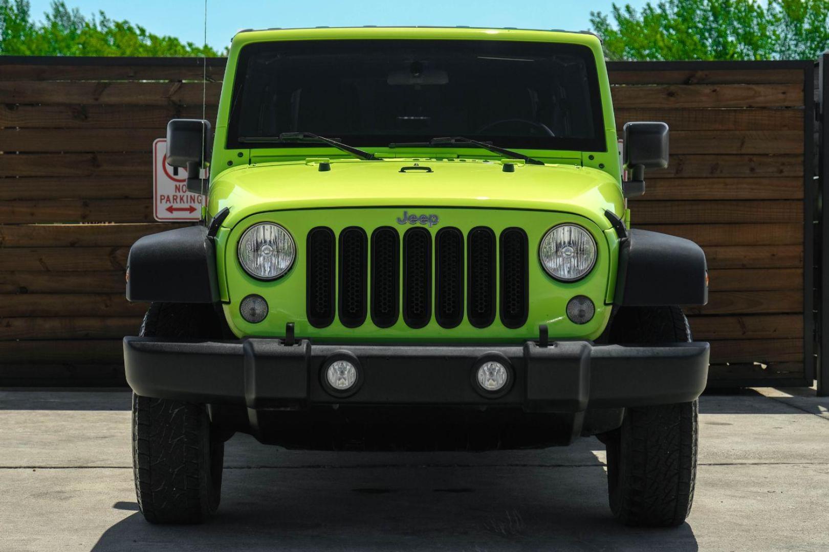 2017 green Jeep Wrangler Unlimited Sport 4WD (1C4BJWDG8HL) with an 3.6L V6 DOHC 24V FFV engine, located at 2401 E Main St., Grand Prairie, TX, 75050, (972) 262-4440, 32.748981, -96.969643 - Photo#2