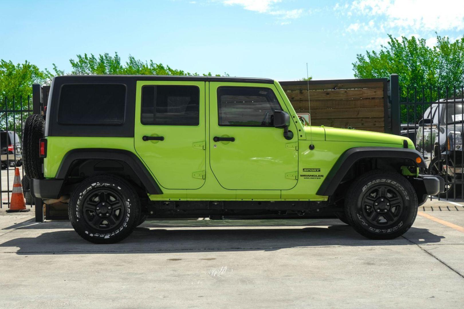 2017 green Jeep Wrangler Unlimited Sport 4WD (1C4BJWDG8HL) with an 3.6L V6 DOHC 24V FFV engine, located at 2401 E Main St., Grand Prairie, TX, 75050, (972) 262-4440, 32.748981, -96.969643 - Photo#4