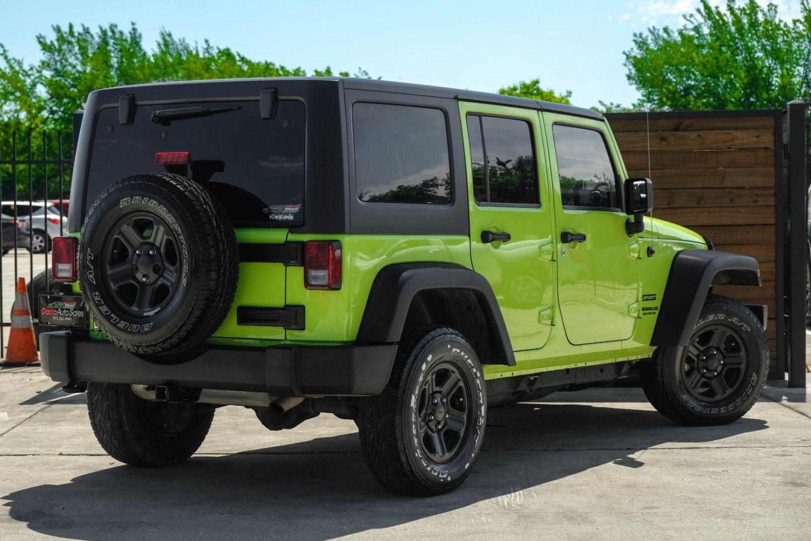 2017 green Jeep Wrangler Unlimited Sport 4WD (1C4BJWDG8HL) with an 3.6L V6 DOHC 24V FFV engine, located at 2401 E Main St., Grand Prairie, TX, 75050, (972) 262-4440, 32.748981, -96.969643 - Photo#5