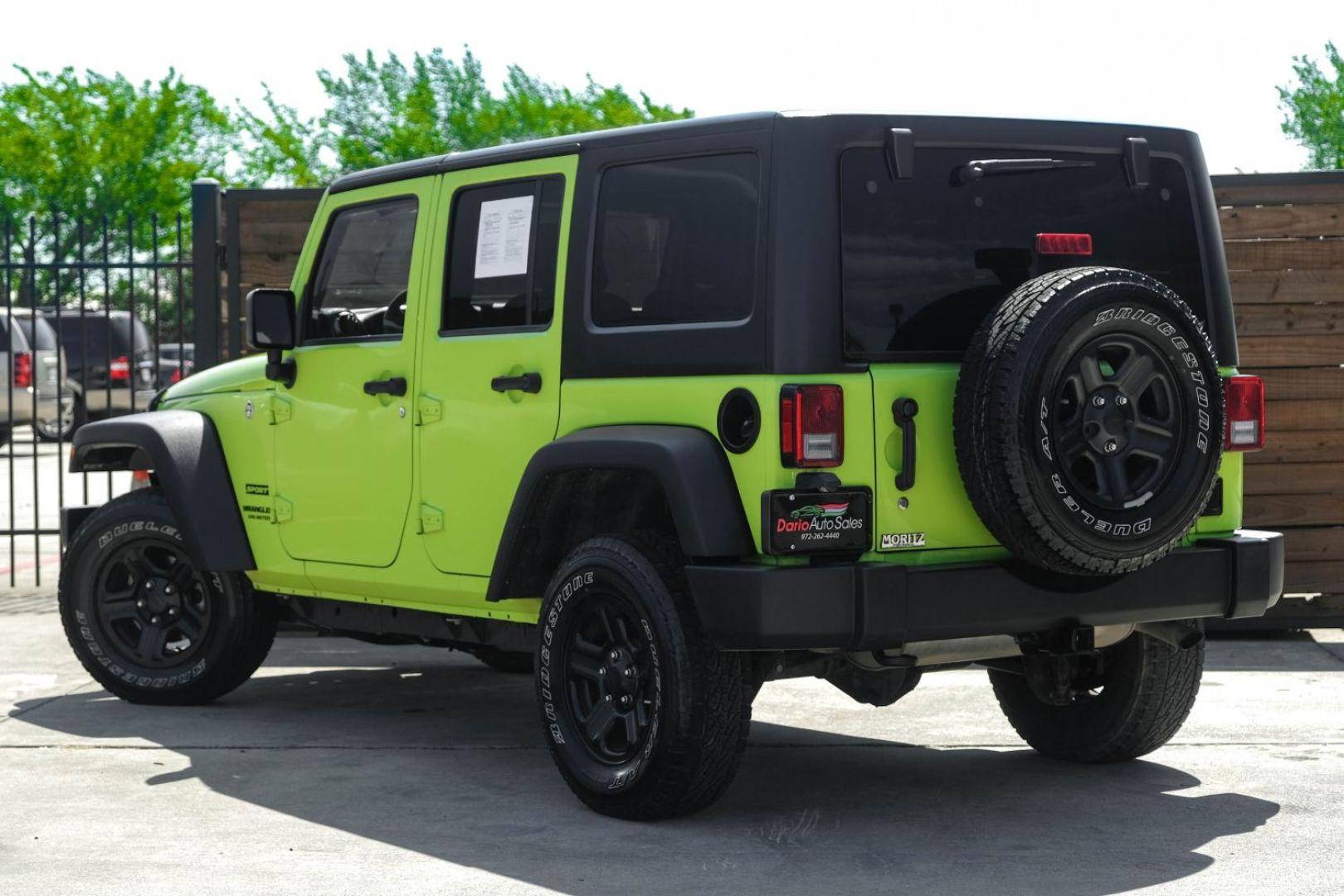 2017 green Jeep Wrangler Unlimited Sport 4WD (1C4BJWDG8HL) with an 3.6L V6 DOHC 24V FFV engine, located at 2401 E Main St., Grand Prairie, TX, 75050, (972) 262-4440, 32.748981, -96.969643 - Photo#6