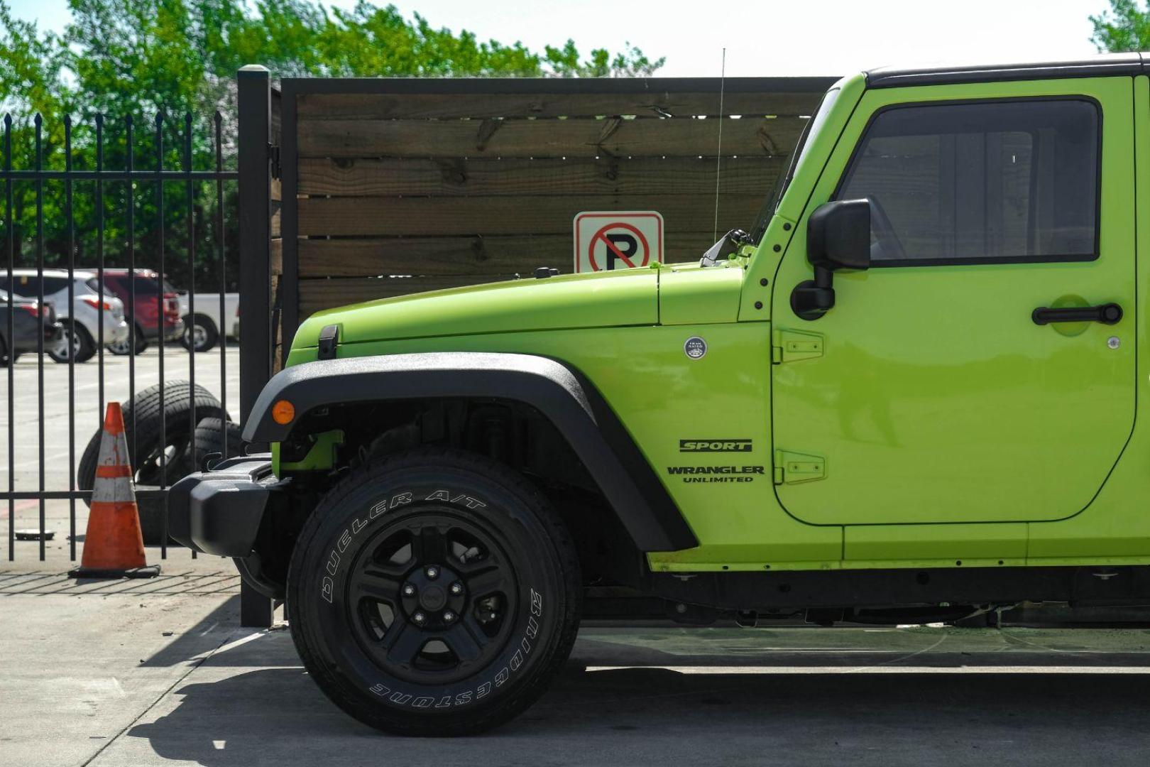 2017 green Jeep Wrangler Unlimited Sport 4WD (1C4BJWDG8HL) with an 3.6L V6 DOHC 24V FFV engine, located at 2401 E Main St., Grand Prairie, TX, 75050, (972) 262-4440, 32.748981, -96.969643 - Photo#8