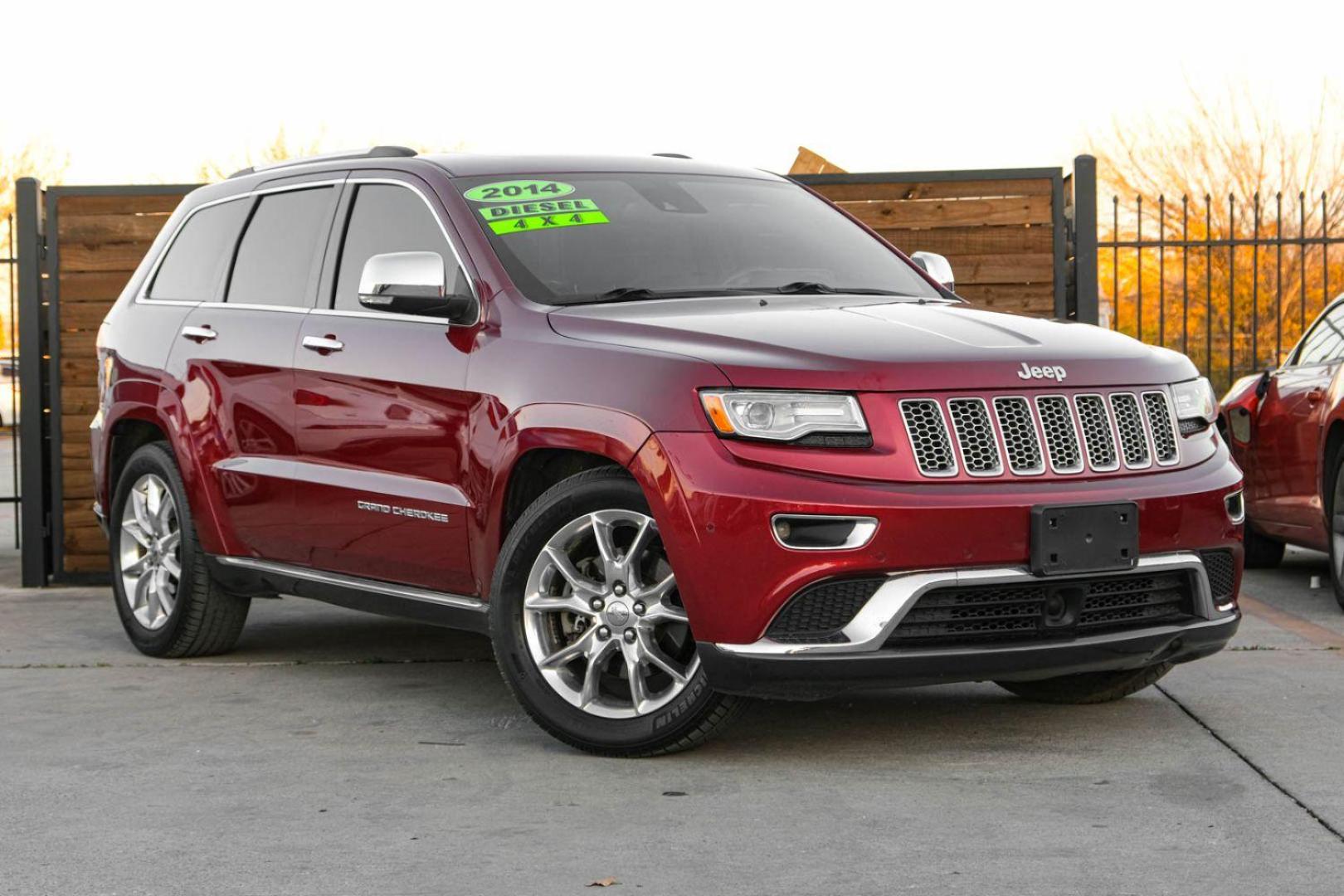 2014 RED Jeep Grand Cherokee Summit 4WD (1C4RJFJM8EC) with an 3.0L V6 DOHC 24V DIESEL engine, 5-Speed Automatic transmission, located at 2401 E Main St., Grand Prairie, TX, 75050, (972) 262-4440, 32.748981, -96.969643 - Photo#3