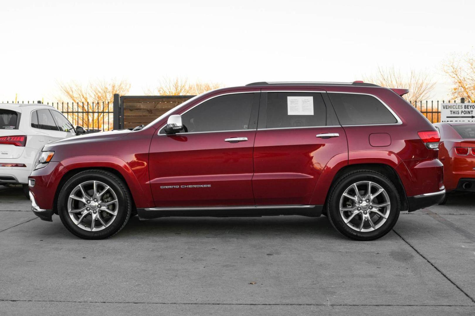 2014 RED Jeep Grand Cherokee Summit 4WD (1C4RJFJM8EC) with an 3.0L V6 DOHC 24V DIESEL engine, 5-Speed Automatic transmission, located at 2401 E Main St., Grand Prairie, TX, 75050, (972) 262-4440, 32.748981, -96.969643 - Photo#8