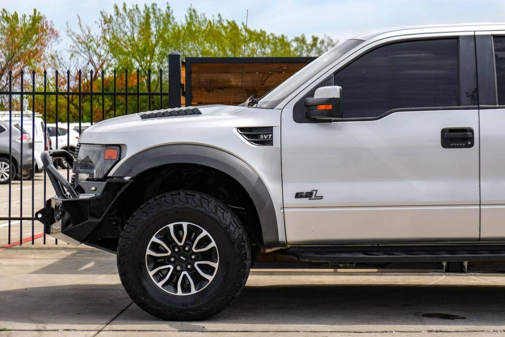 2013 silver Ford F-150 SVT Raptor SuperCrew 5.5-ft. Bed 4WD (1FTFW1R68DF) with an 6.2L V8 SOHC 16V engine, 6-Speed Automatic transmission, located at 2401 E Main St., Grand Prairie, TX, 75050, (972) 262-4440, 32.748981, -96.969643 - Photo#9