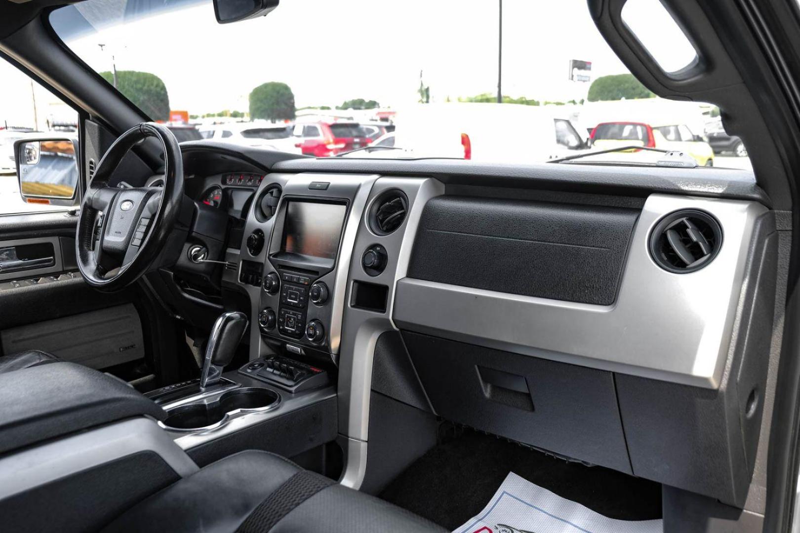 2013 silver Ford F-150 SVT Raptor SuperCrew 5.5-ft. Bed 4WD (1FTFW1R68DF) with an 6.2L V8 SOHC 16V engine, 6-Speed Automatic transmission, located at 2401 E Main St., Grand Prairie, TX, 75050, (972) 262-4440, 32.748981, -96.969643 - Photo#11