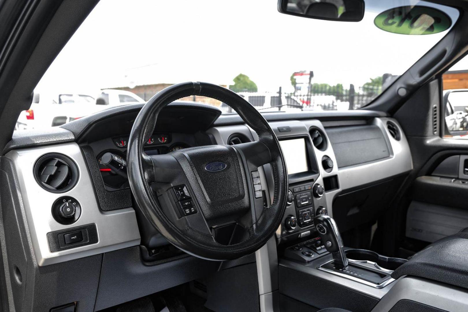 2013 silver Ford F-150 SVT Raptor SuperCrew 5.5-ft. Bed 4WD (1FTFW1R68DF) with an 6.2L V8 SOHC 16V engine, 6-Speed Automatic transmission, located at 2401 E Main St., Grand Prairie, TX, 75050, (972) 262-4440, 32.748981, -96.969643 - Photo#13