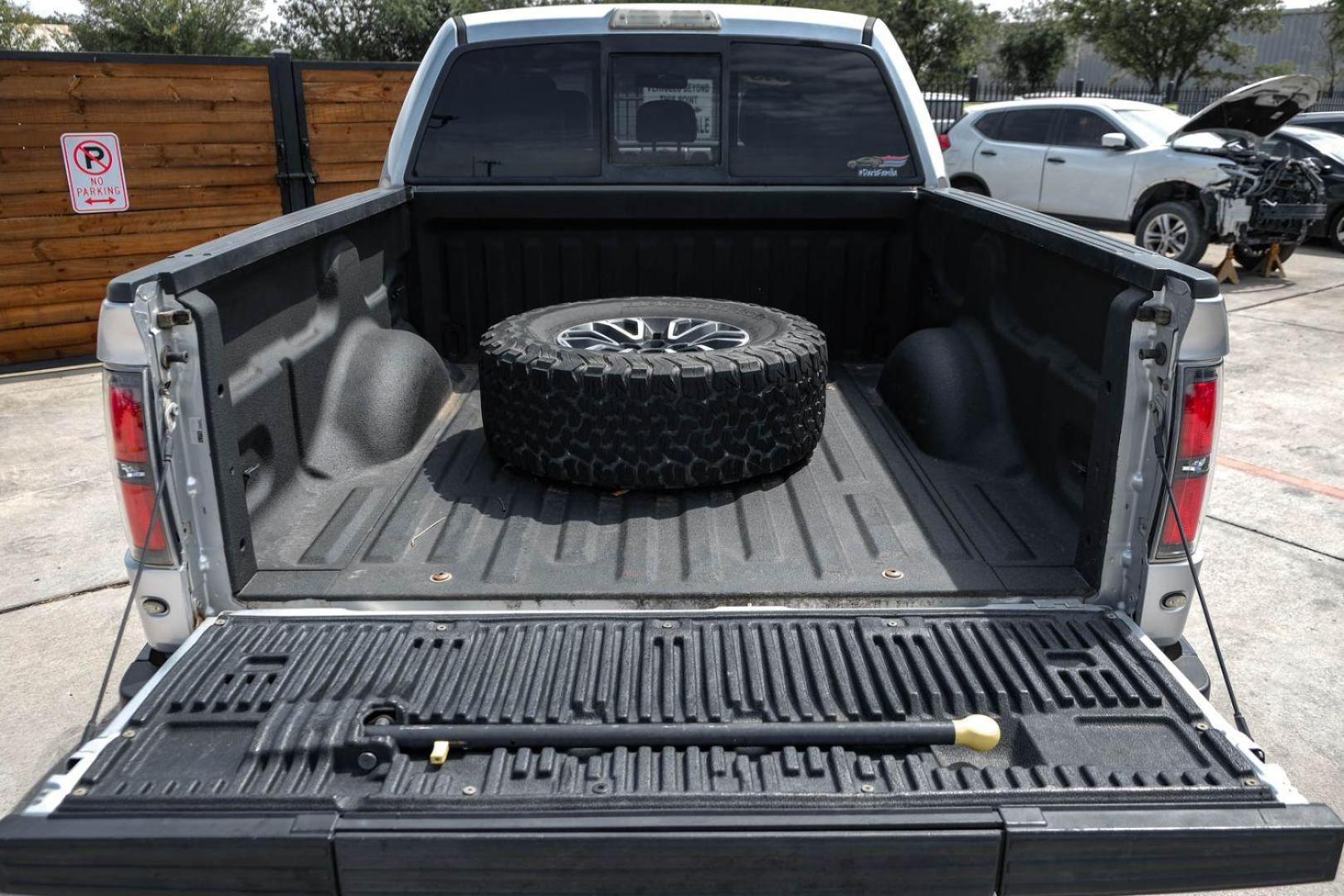 2013 silver Ford F-150 SVT Raptor SuperCrew 5.5-ft. Bed 4WD (1FTFW1R68DF) with an 6.2L V8 SOHC 16V engine, 6-Speed Automatic transmission, located at 2401 E Main St., Grand Prairie, TX, 75050, (972) 262-4440, 32.748981, -96.969643 - Photo#48