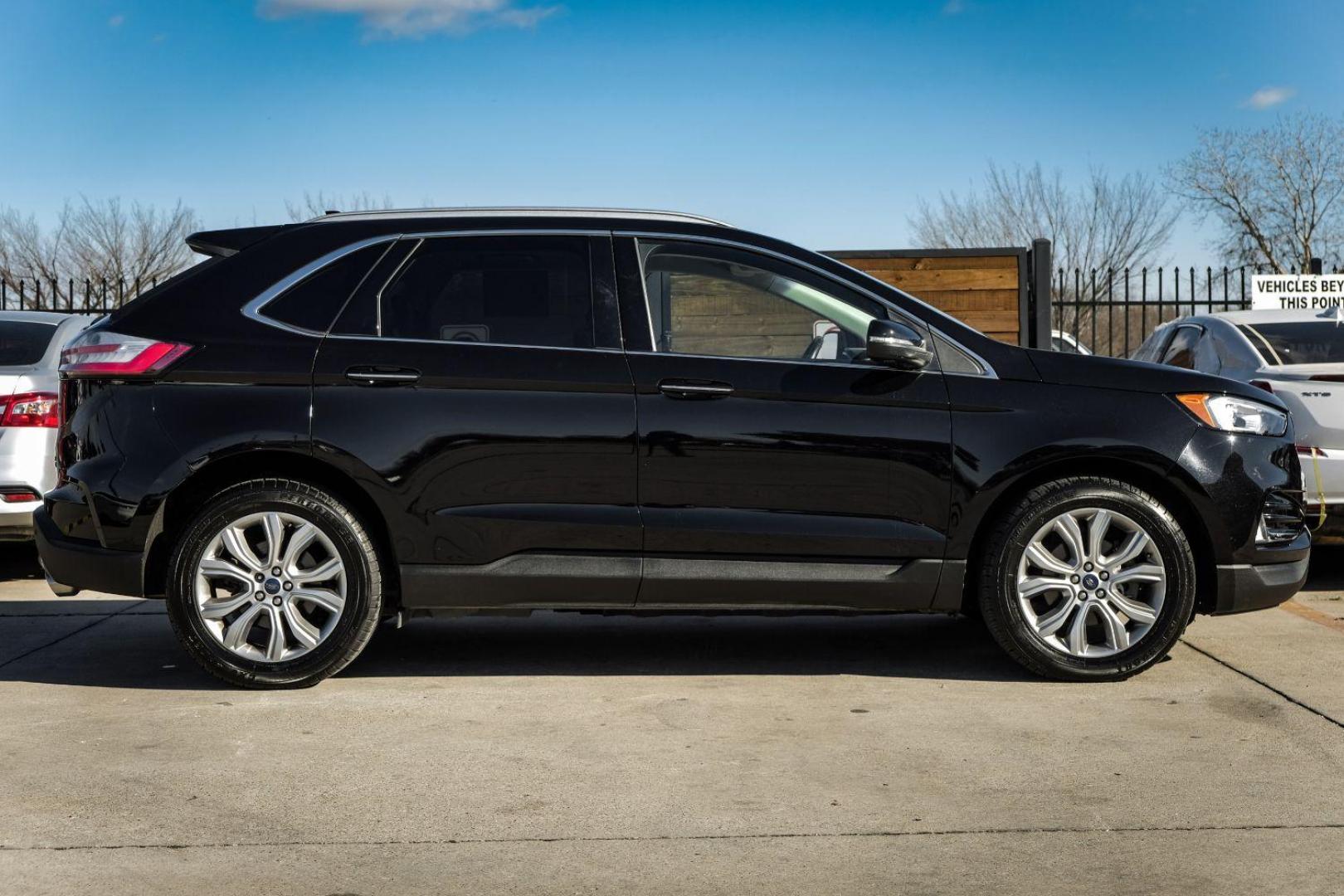 2019 Black Ford Edge Titanium (2FMPK3K99KB) with an 2.0L L4 DOHC 16V engine, 6-Speed Automatic transmission, located at 2401 E Main St., Grand Prairie, TX, 75050, (972) 262-4440, 32.748981, -96.969643 - Photo#4