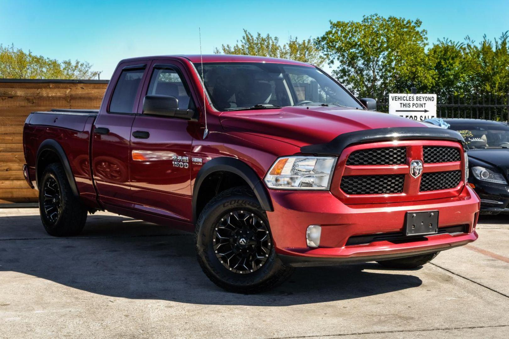 2013 MAROON RAM 1500 Tradesman Quad Cab 4WD (1C6RR7FTXDS) with an 5.7L V8 OHV 16V engine, 6-Speed Automatic transmission, located at 2401 E Main St., Grand Prairie, TX, 75050, (972) 262-4440, 32.748981, -96.969643 - Photo#3