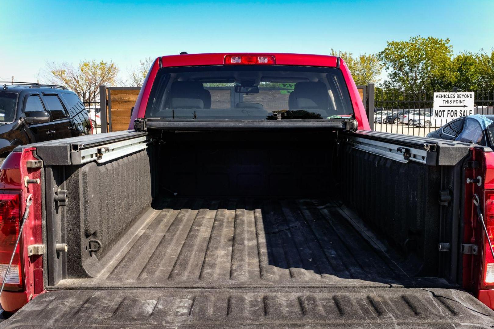 2013 MAROON RAM 1500 Tradesman Quad Cab 4WD (1C6RR7FTXDS) with an 5.7L V8 OHV 16V engine, 6-Speed Automatic transmission, located at 2401 E Main St., Grand Prairie, TX, 75050, (972) 262-4440, 32.748981, -96.969643 - Photo#43