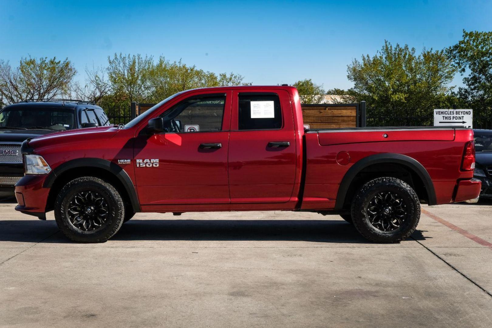 2013 MAROON RAM 1500 Tradesman Quad Cab 4WD (1C6RR7FTXDS) with an 5.7L V8 OHV 16V engine, 6-Speed Automatic transmission, located at 2401 E Main St., Grand Prairie, TX, 75050, (972) 262-4440, 32.748981, -96.969643 - Photo#8