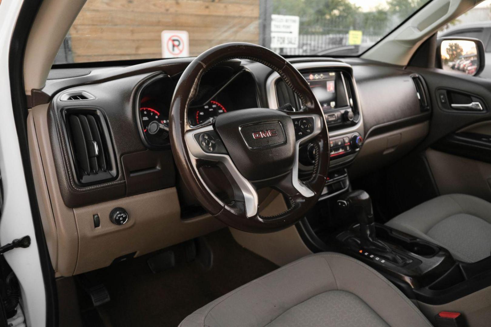 2015 WHITE GMC Canyon SLE Ext. Cab 2WD (1GTH5BEA3F1) with an 2.5L L4 DOHC 24V engine, 6-Speed Automatic transmission, located at 2401 E Main St., Grand Prairie, TX, 75050, (972) 262-4440, 32.748981, -96.969643 - Photo#12