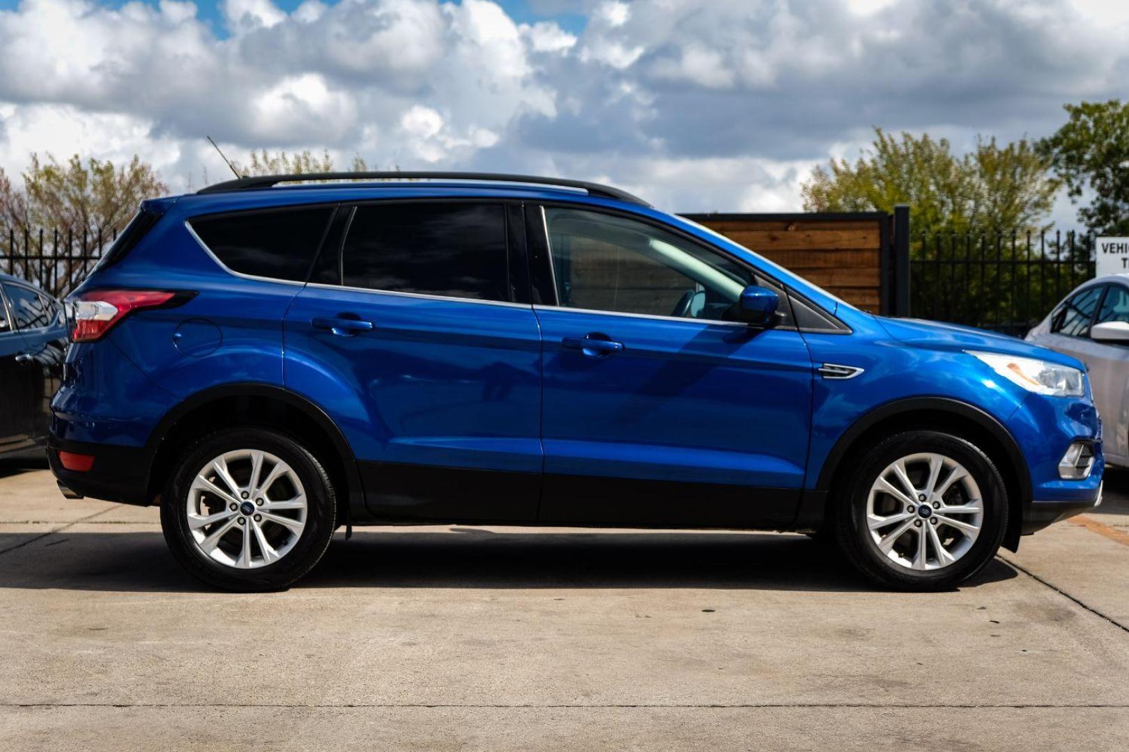 2018 BLUE Ford Escape SEL 4WD (1FMCU9HD5JU) with an 1.5L L4 DOHC 16V engine, 6-Speed Automatic transmission, located at 2401 E Main St., Grand Prairie, TX, 75050, (972) 262-4440, 32.748981, -96.969643 - Photo#4