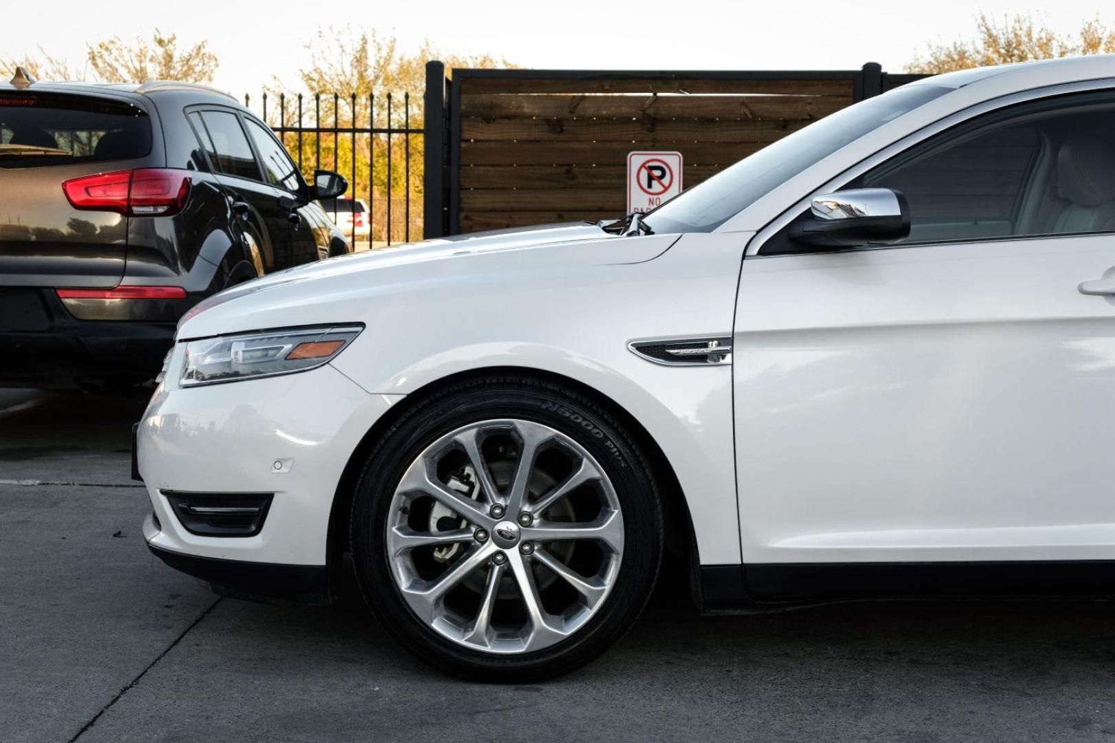 2013 WHITE Ford Taurus Limited FWD (1FAHP2F97DG) with an 2.0L L4 DOHC 16V engine, 6-Speed Automatic transmission, located at 2401 E Main St., Grand Prairie, TX, 75050, (972) 262-4440, 32.748981, -96.969643 - Photo#9