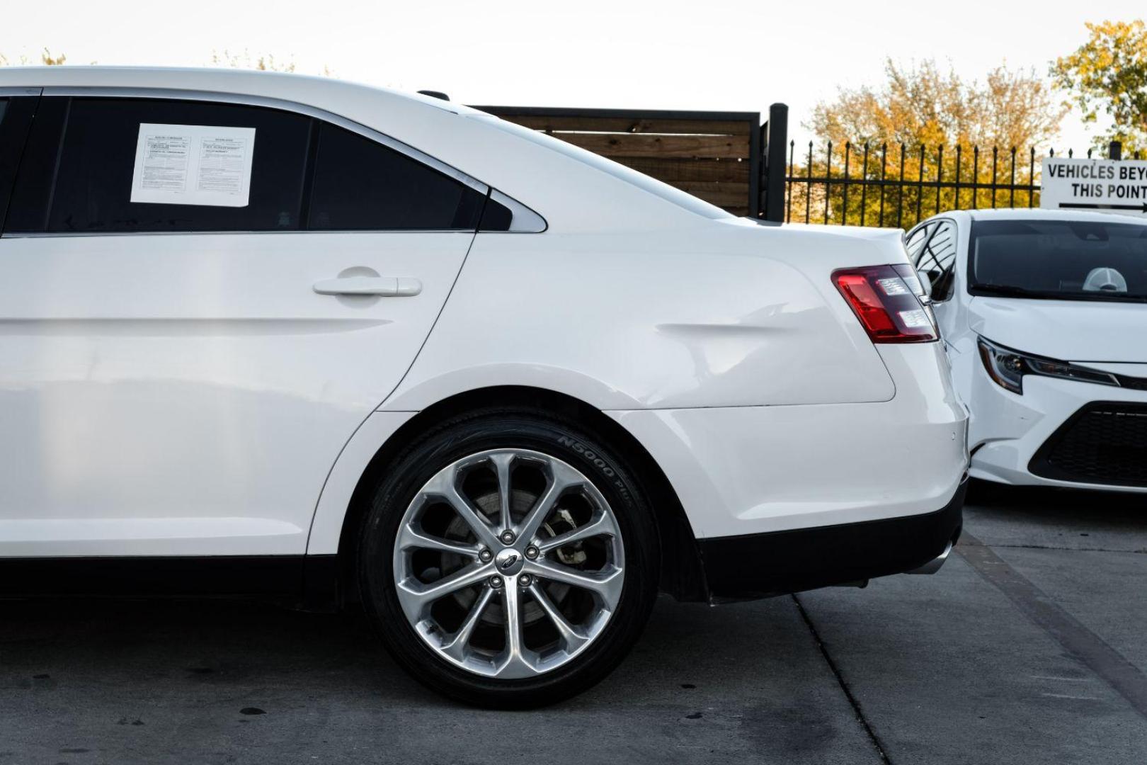 2013 WHITE Ford Taurus Limited FWD (1FAHP2F97DG) with an 2.0L L4 DOHC 16V engine, 6-Speed Automatic transmission, located at 2401 E Main St., Grand Prairie, TX, 75050, (972) 262-4440, 32.748981, -96.969643 - Photo#10