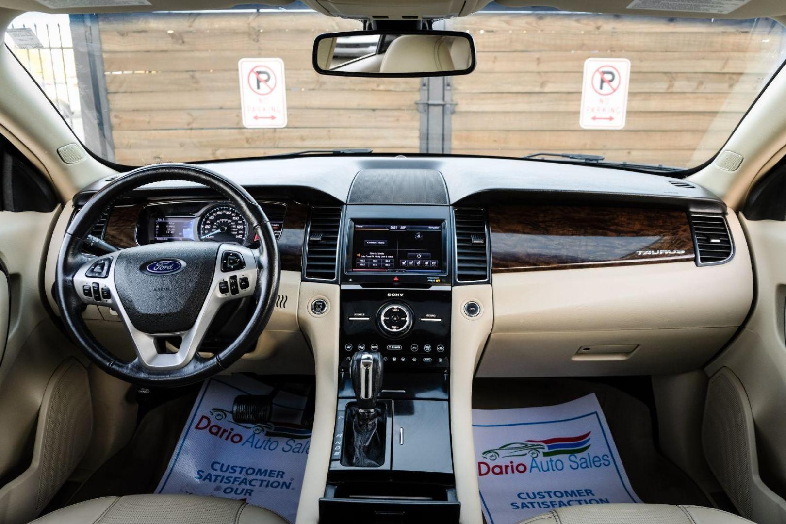 2013 WHITE Ford Taurus Limited FWD (1FAHP2F97DG) with an 2.0L L4 DOHC 16V engine, 6-Speed Automatic transmission, located at 2401 E Main St., Grand Prairie, TX, 75050, (972) 262-4440, 32.748981, -96.969643 - Photo#12