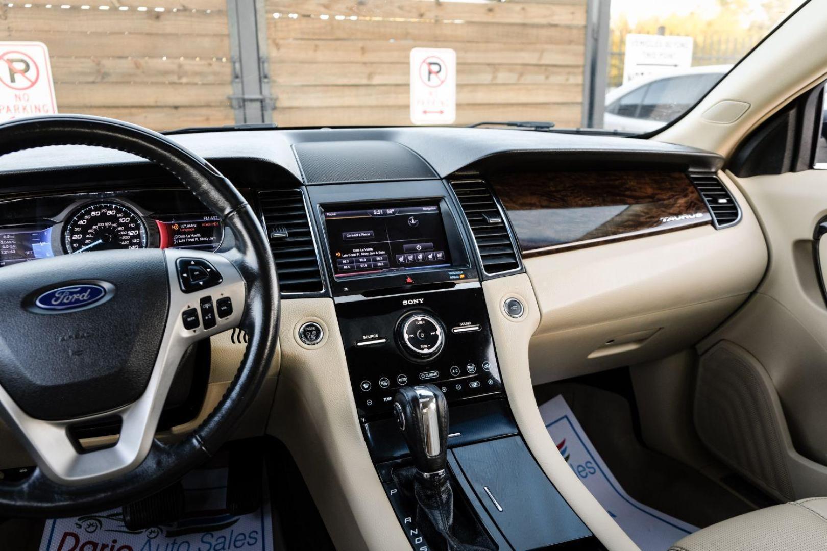 2013 WHITE Ford Taurus Limited FWD (1FAHP2F97DG) with an 2.0L L4 DOHC 16V engine, 6-Speed Automatic transmission, located at 2401 E Main St., Grand Prairie, TX, 75050, (972) 262-4440, 32.748981, -96.969643 - Photo#22