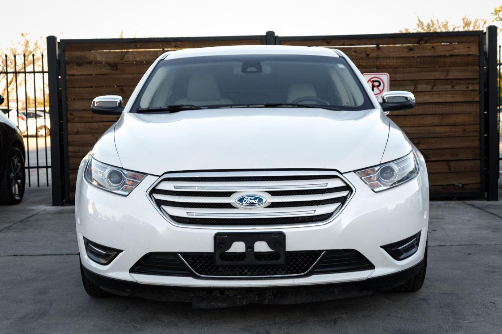 2013 WHITE Ford Taurus Limited FWD (1FAHP2F97DG) with an 2.0L L4 DOHC 16V engine, 6-Speed Automatic transmission, located at 2401 E Main St., Grand Prairie, TX, 75050, (972) 262-4440, 32.748981, -96.969643 - Photo#2