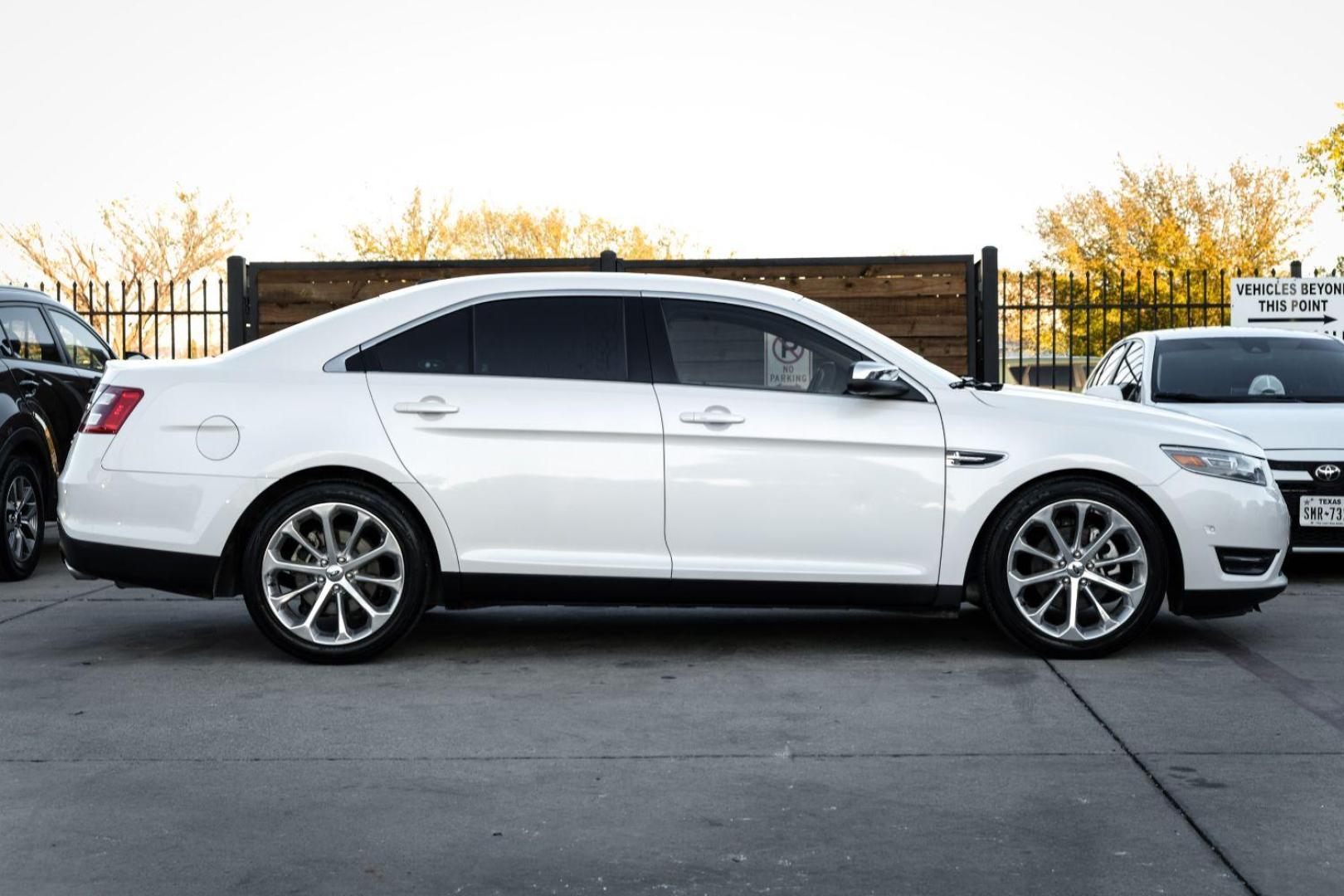 2013 WHITE Ford Taurus Limited FWD (1FAHP2F97DG) with an 2.0L L4 DOHC 16V engine, 6-Speed Automatic transmission, located at 2401 E Main St., Grand Prairie, TX, 75050, (972) 262-4440, 32.748981, -96.969643 - Photo#4