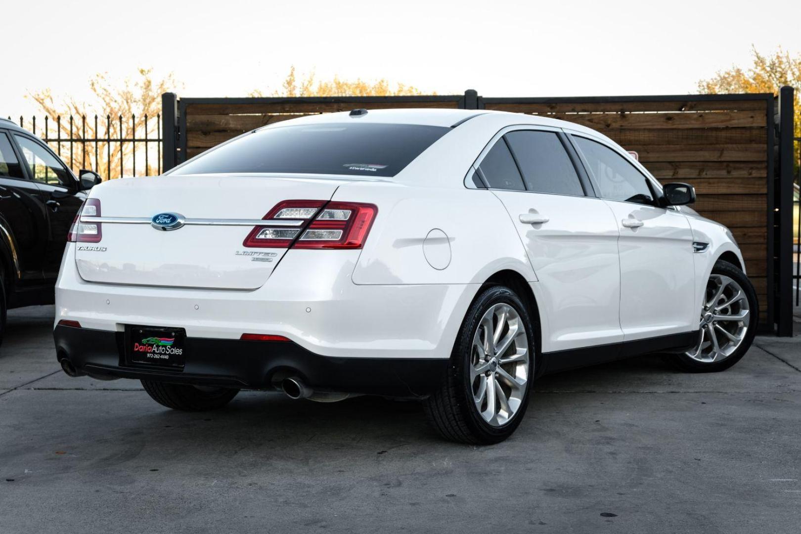 2013 WHITE Ford Taurus Limited FWD (1FAHP2F97DG) with an 2.0L L4 DOHC 16V engine, 6-Speed Automatic transmission, located at 2401 E Main St., Grand Prairie, TX, 75050, (972) 262-4440, 32.748981, -96.969643 - Photo#5