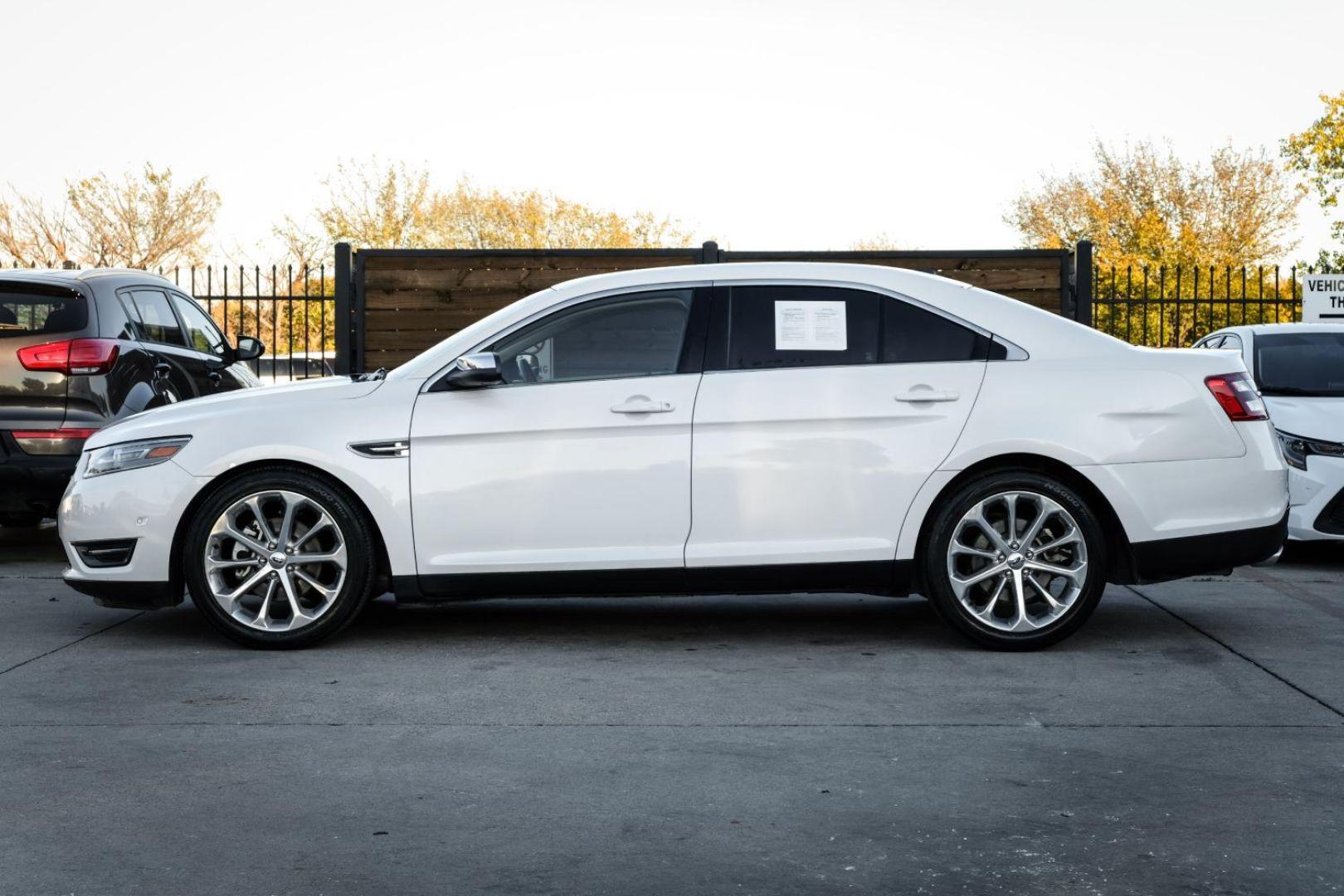 2013 WHITE Ford Taurus Limited FWD (1FAHP2F97DG) with an 2.0L L4 DOHC 16V engine, 6-Speed Automatic transmission, located at 2401 E Main St., Grand Prairie, TX, 75050, (972) 262-4440, 32.748981, -96.969643 - Photo#8