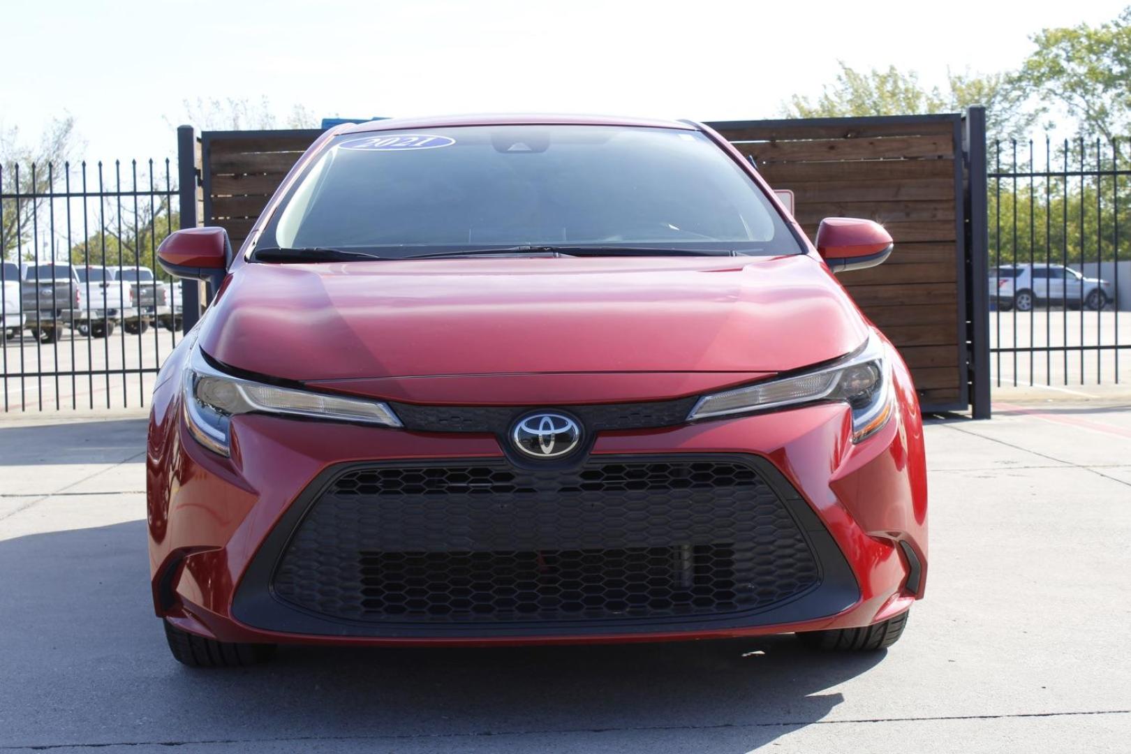 2021 RED Toyota Corolla LE (JTDEPMAE6MJ) with an 1.8L L4 DOHC 16V engine, Continuously Variabl transmission, located at 2401 E Main St., Grand Prairie, TX, 75050, (972) 262-4440, 32.748981, -96.969643 - Photo#0