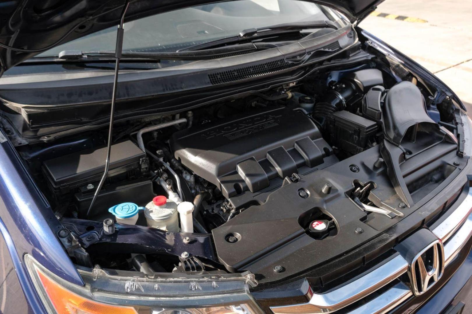 2015 BLUE Honda Odyssey EX-L (5FNRL5H65FB) with an 3.5L V6 SOHC 24V engine, 6-Speed Automatic transmission, located at 2401 E Main St., Grand Prairie, TX, 75050, (972) 262-4440, 32.748981, -96.969643 - Photo#45