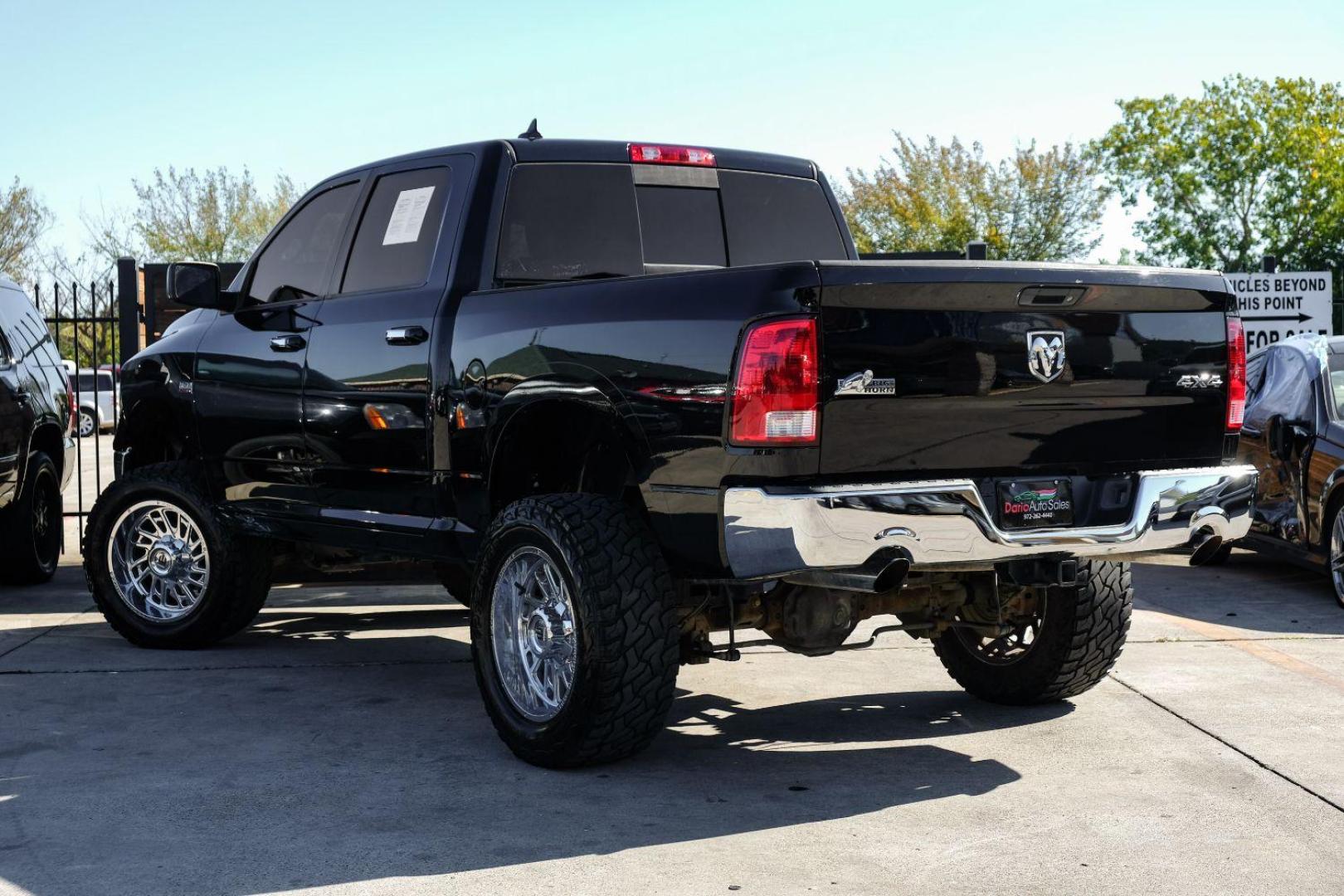 2014 BLACK RAM 1500 SLT Crew Cab SWB 4WD (1C6RR7LT0ES) with an 5.7L V8 OHV 16V engine, 8-Speed Automatic transmission, located at 2401 E Main St., Grand Prairie, TX, 75050, (972) 262-4440, 32.748981, -96.969643 - Photo#7