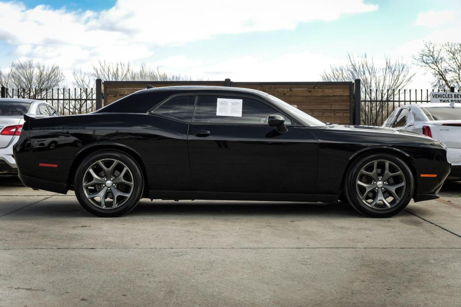 2015 BLACK Dodge Challenger SXT (2C3CDZAG6FH) with an 3.6L V6 DOHC 24V engine, 5-Speed Automatic transmission, located at 2401 E Main St., Grand Prairie, TX, 75050, (972) 262-4440, 32.748981, -96.969643 - Photo#4