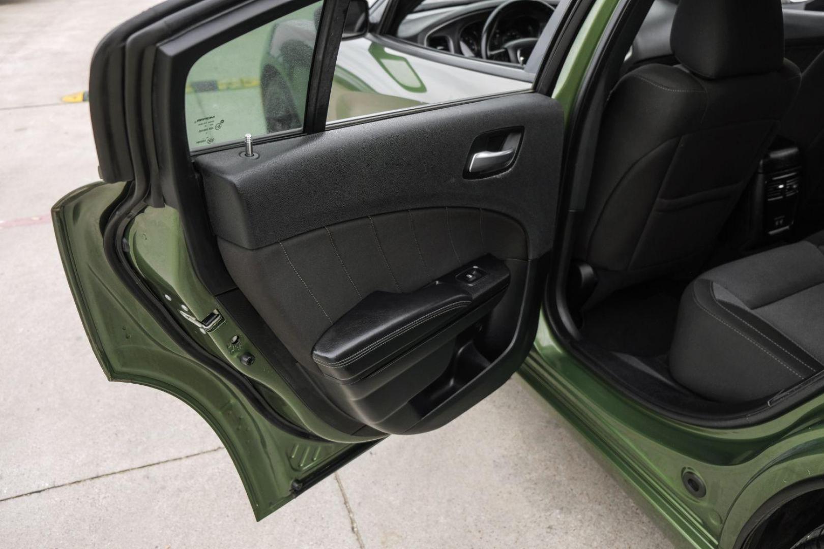 2020 GREEN Dodge Charger SXT (2C3CDXBG3LH) with an 3.6L V6 DOHC 24V engine, 8-Speed Automatic transmission, located at 2401 E Main St., Grand Prairie, TX, 75050, (972) 262-4440, 32.748981, -96.969643 - Photo#49