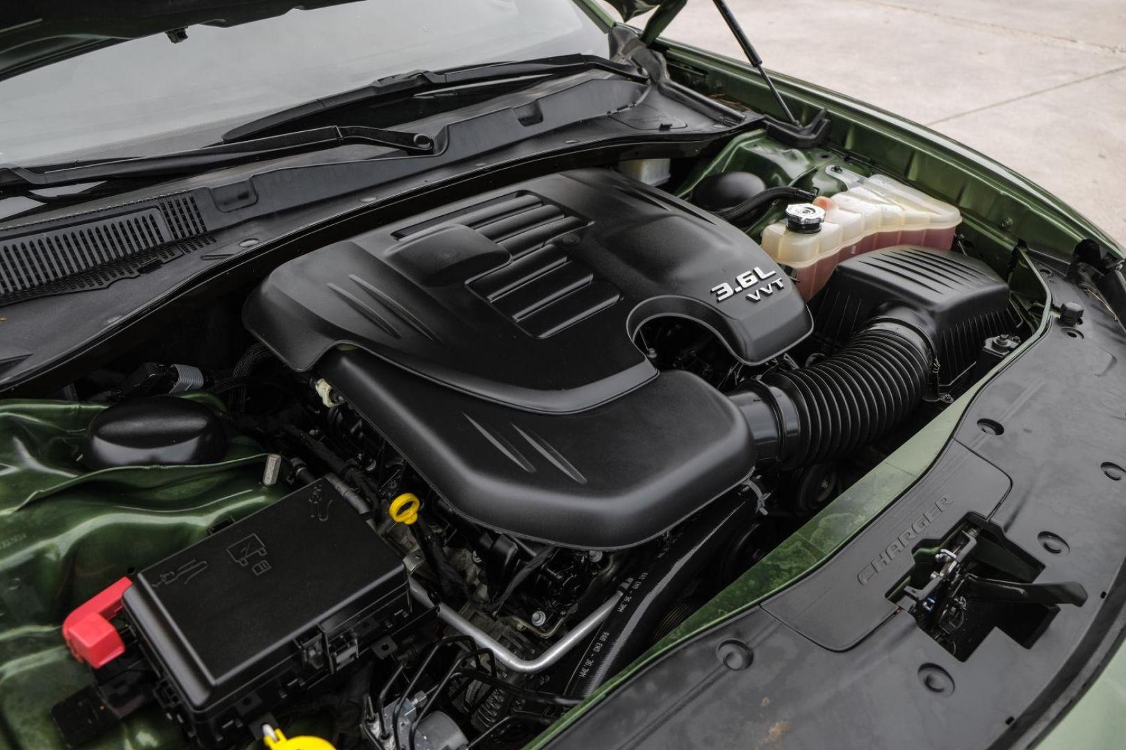 2020 GREEN Dodge Charger SXT (2C3CDXBG3LH) with an 3.6L V6 DOHC 24V engine, 8-Speed Automatic transmission, located at 2401 E Main St., Grand Prairie, TX, 75050, (972) 262-4440, 32.748981, -96.969643 - Photo#57