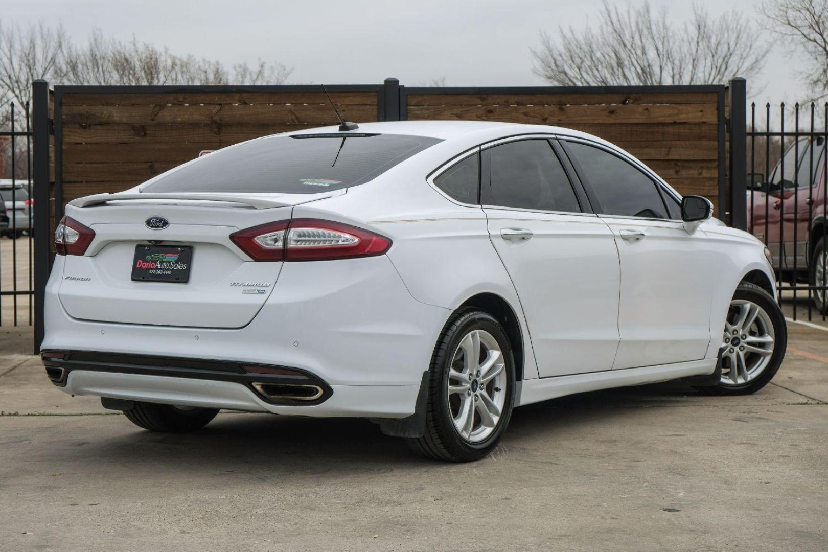 2016 white Ford Fusion Titanium AWD (3FA6P0D98GR) with an 2.0L L4 DOHC 16V engine, 6-Speed Automatic transmission, located at 2401 E Main St., Grand Prairie, TX, 75050, (972) 262-4440, 32.748981, -96.969643 - Photo#12