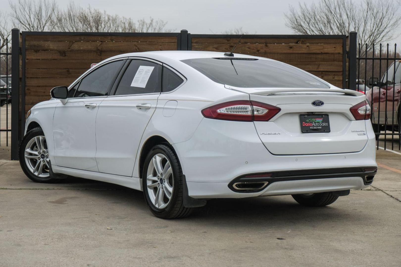 2016 white Ford Fusion Titanium AWD (3FA6P0D98GR) with an 2.0L L4 DOHC 16V engine, 6-Speed Automatic transmission, located at 2401 E Main St., Grand Prairie, TX, 75050, (972) 262-4440, 32.748981, -96.969643 - Photo#14