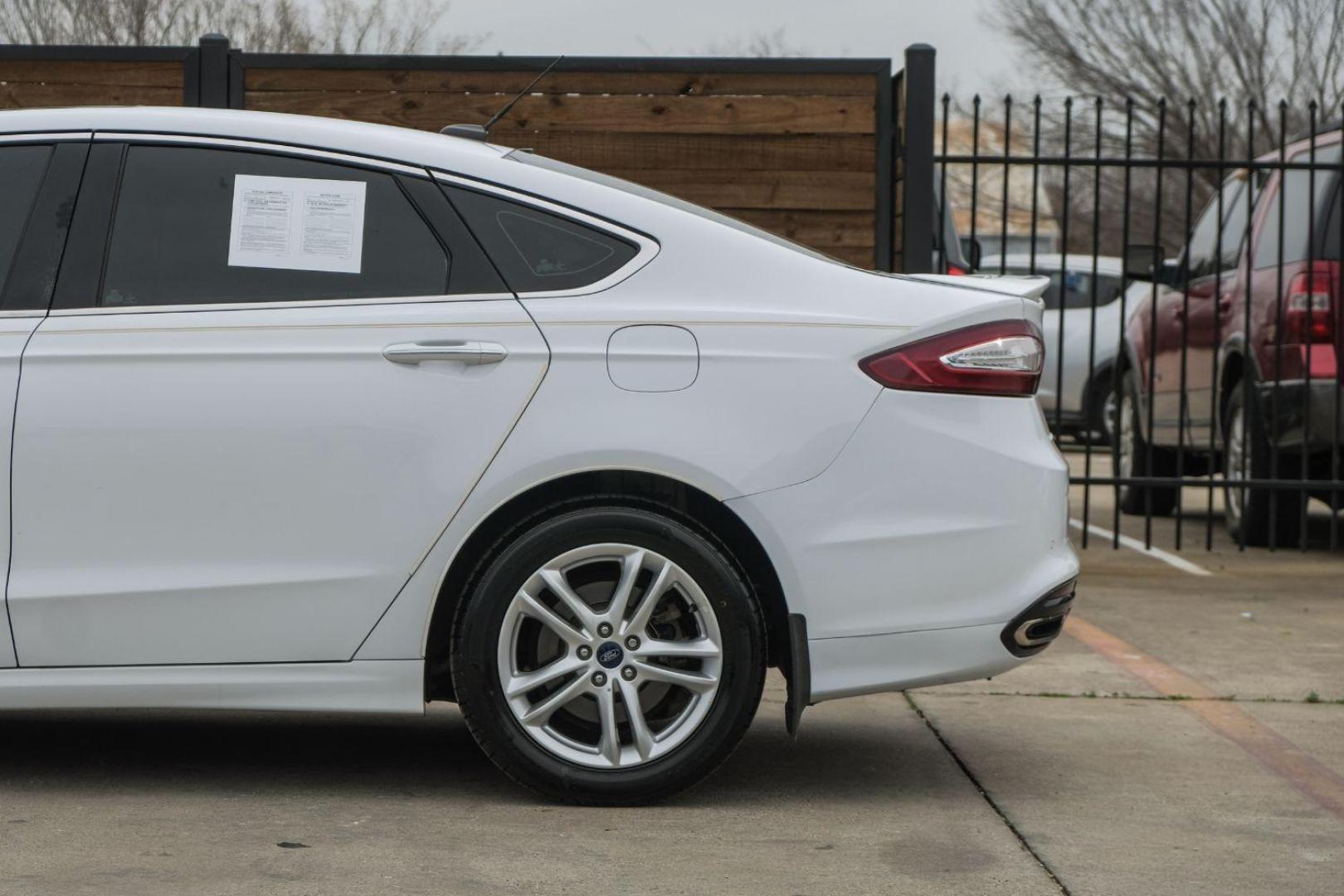 2016 white Ford Fusion Titanium AWD (3FA6P0D98GR) with an 2.0L L4 DOHC 16V engine, 6-Speed Automatic transmission, located at 2401 E Main St., Grand Prairie, TX, 75050, (972) 262-4440, 32.748981, -96.969643 - Photo#17