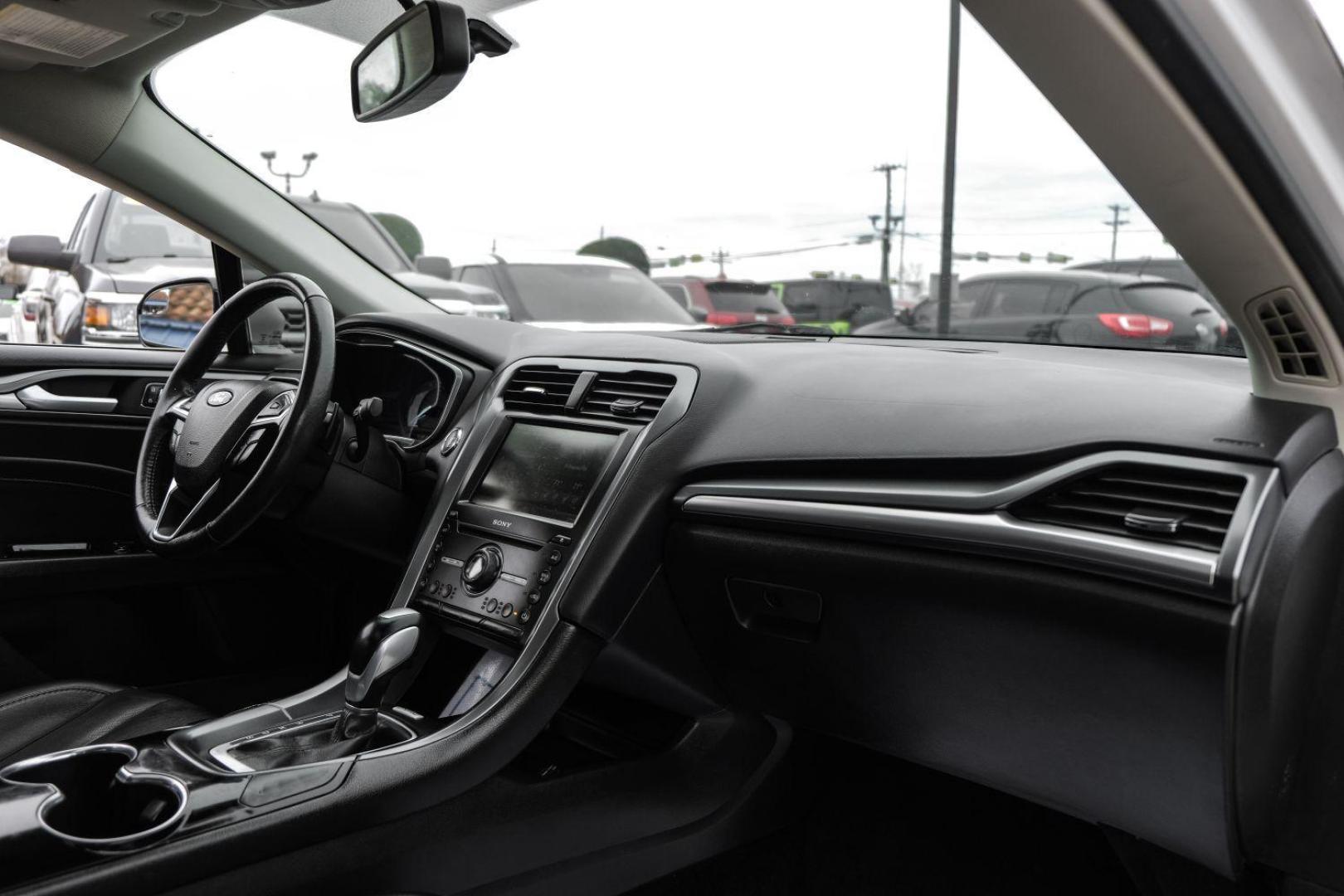 2016 white Ford Fusion Titanium AWD (3FA6P0D98GR) with an 2.0L L4 DOHC 16V engine, 6-Speed Automatic transmission, located at 2401 E Main St., Grand Prairie, TX, 75050, (972) 262-4440, 32.748981, -96.969643 - Photo#18