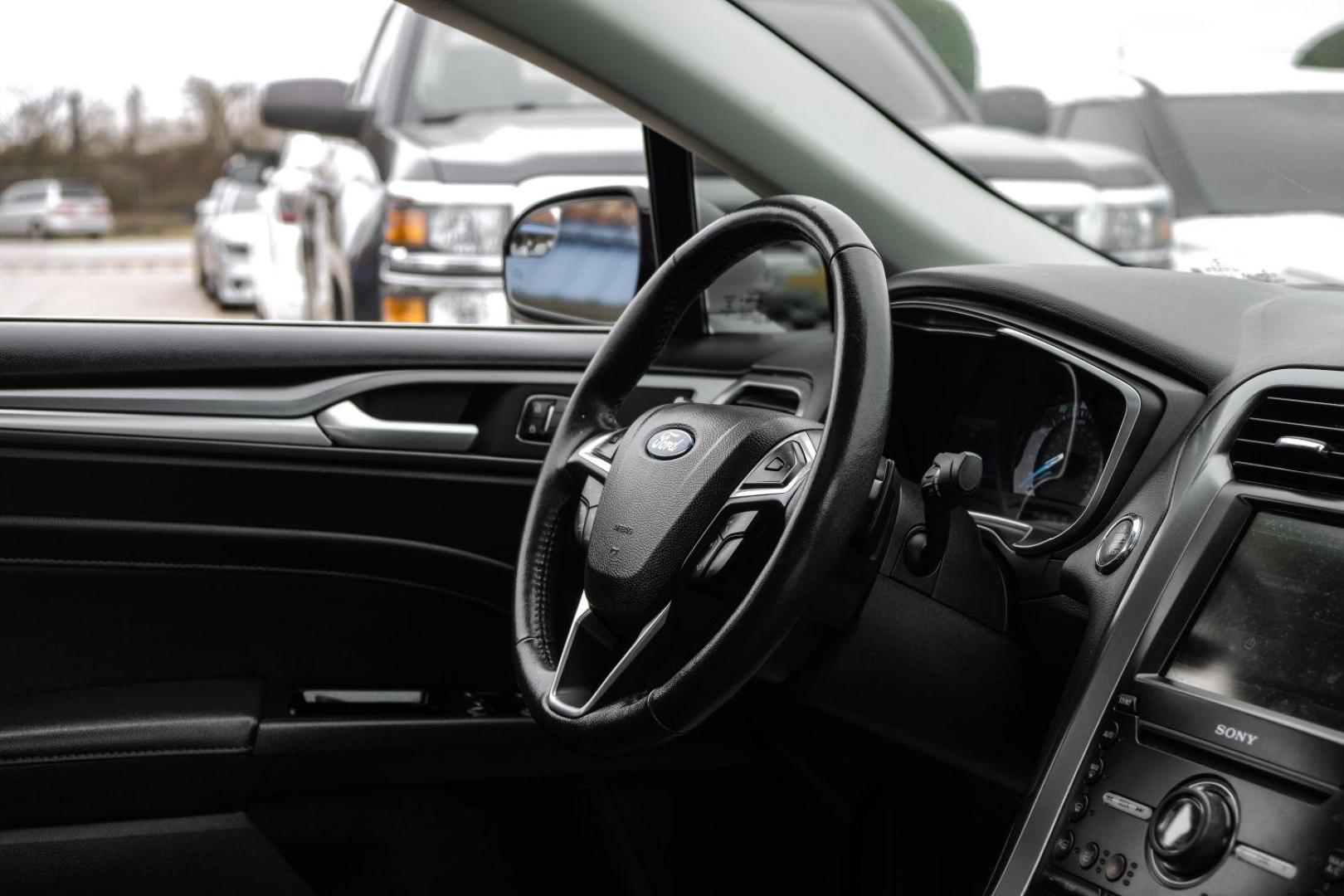 2016 white Ford Fusion Titanium AWD (3FA6P0D98GR) with an 2.0L L4 DOHC 16V engine, 6-Speed Automatic transmission, located at 2401 E Main St., Grand Prairie, TX, 75050, (972) 262-4440, 32.748981, -96.969643 - Photo#20