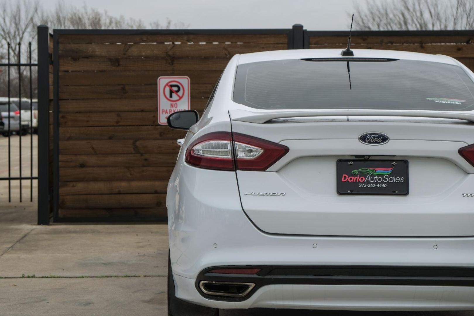 2016 white Ford Fusion Titanium AWD (3FA6P0D98GR) with an 2.0L L4 DOHC 16V engine, 6-Speed Automatic transmission, located at 2401 E Main St., Grand Prairie, TX, 75050, (972) 262-4440, 32.748981, -96.969643 - Photo#52