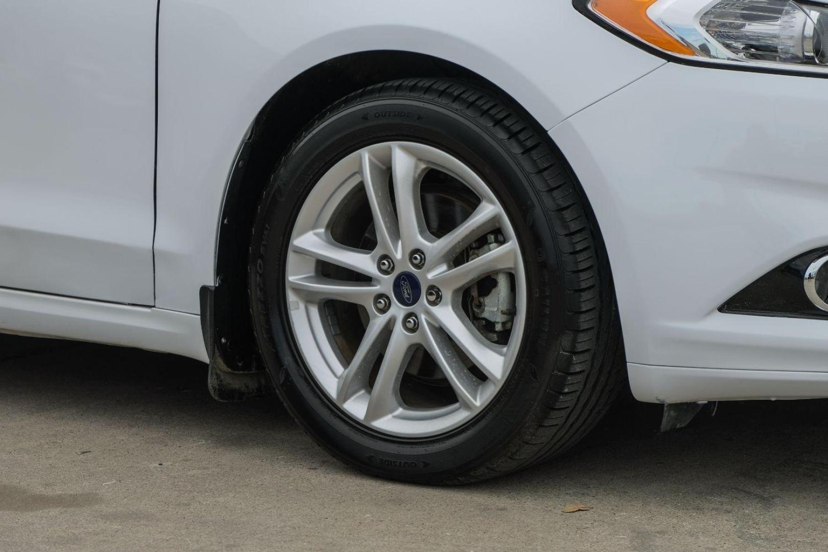 2016 white Ford Fusion Titanium AWD (3FA6P0D98GR) with an 2.0L L4 DOHC 16V engine, 6-Speed Automatic transmission, located at 2401 E Main St., Grand Prairie, TX, 75050, (972) 262-4440, 32.748981, -96.969643 - Photo#62